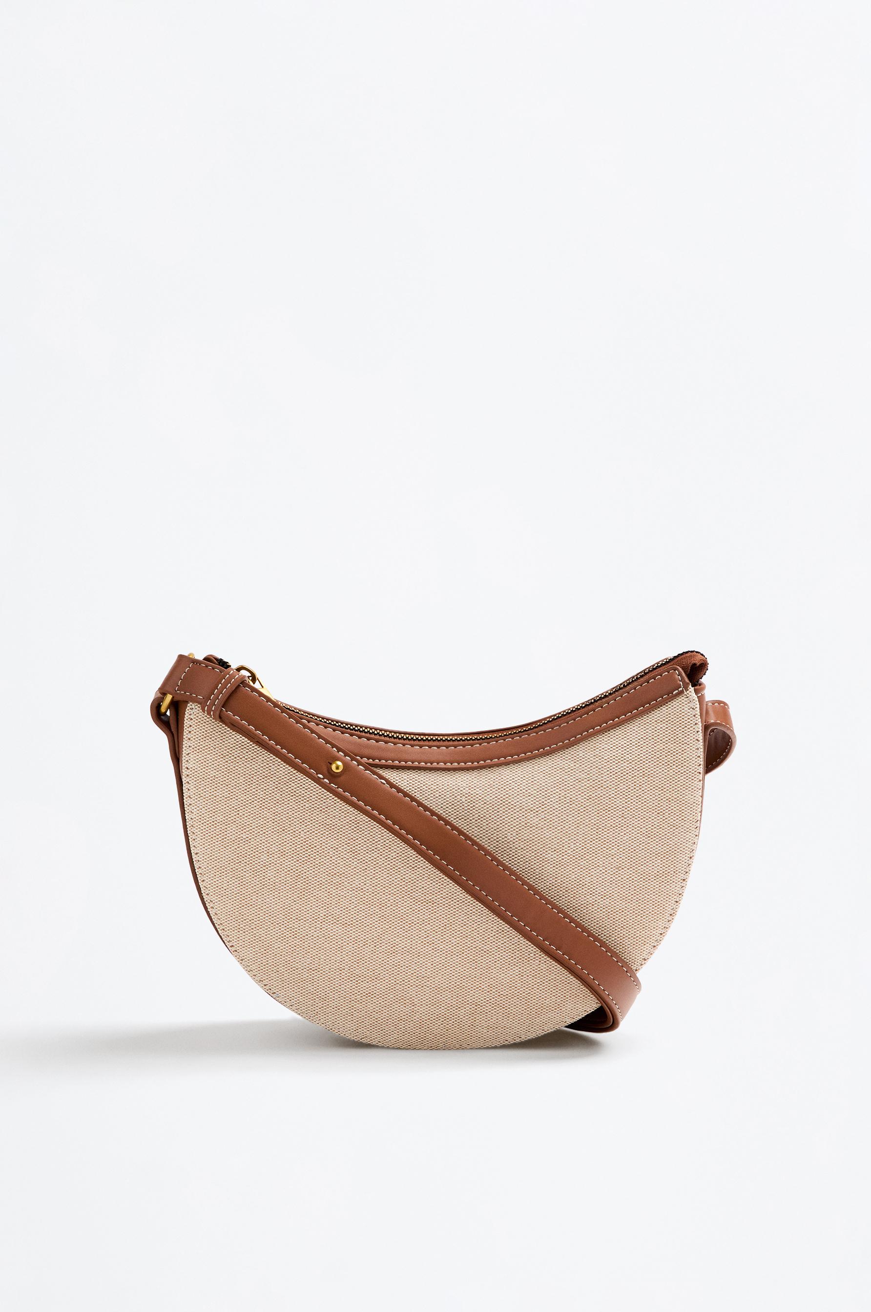Bolsa de ombro de lona com textura contrastante