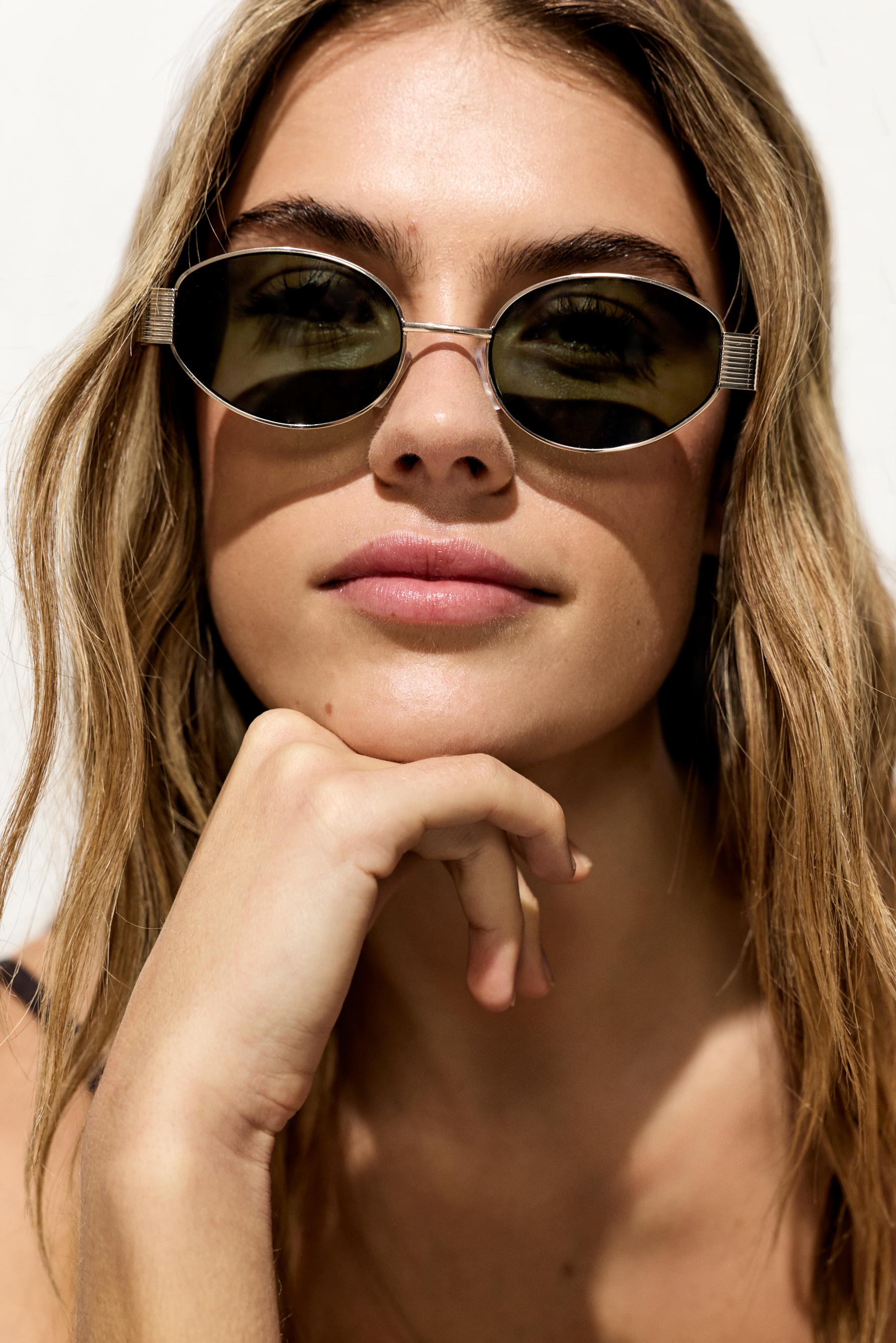 Oval metallic sunglasses — GOLD