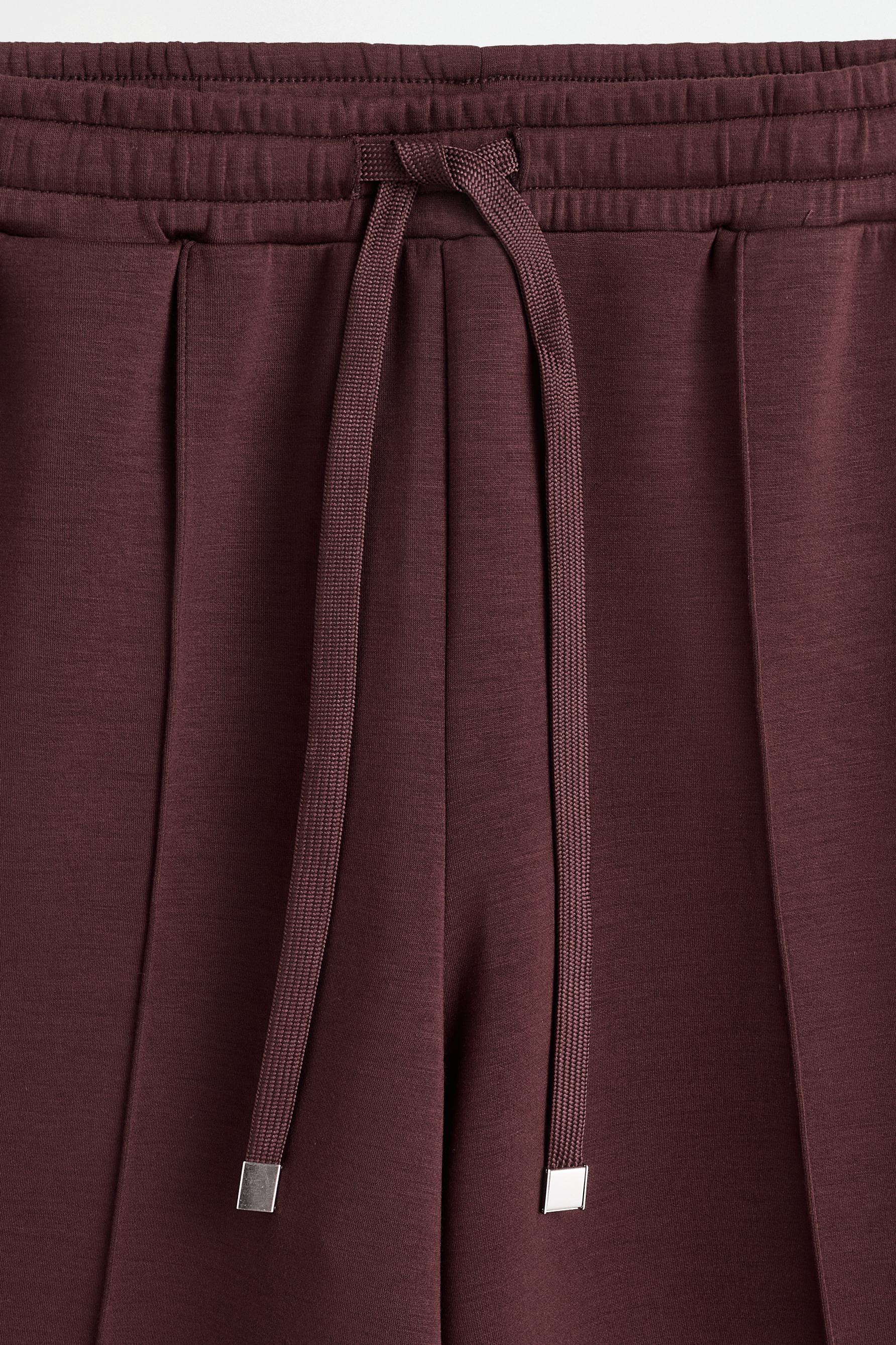 Wide-leg tracksuit trousers with front seam — WINE