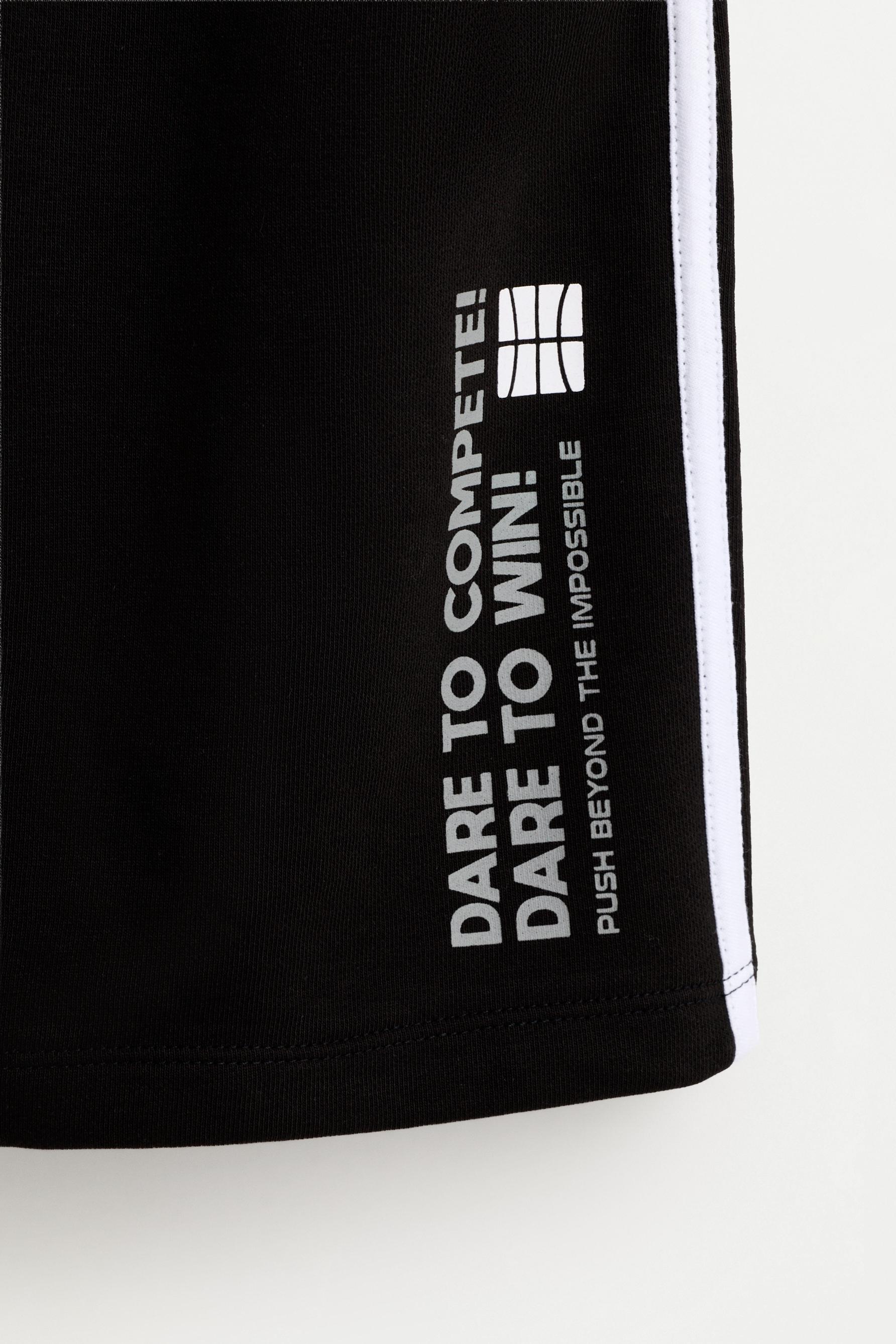 Side-stripe Bermuda shorts — BLACK