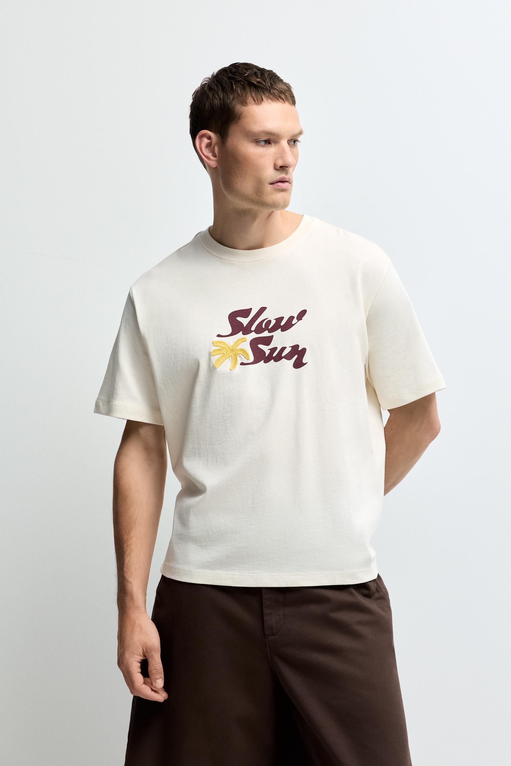 Embroidered text T-shirt — BUTTER