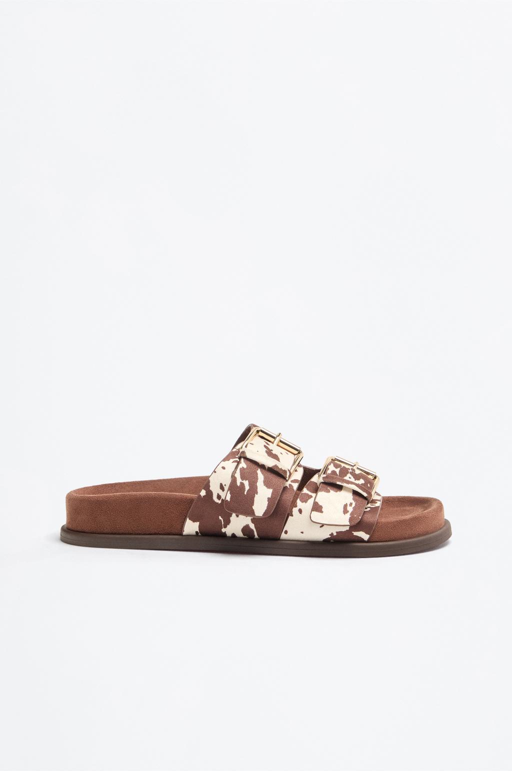 Flat sandals with double buckle