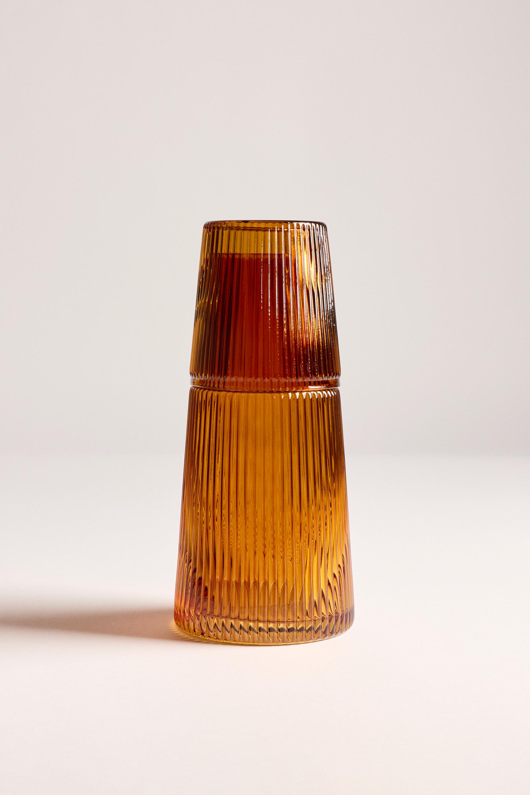 Botella cristal rayada