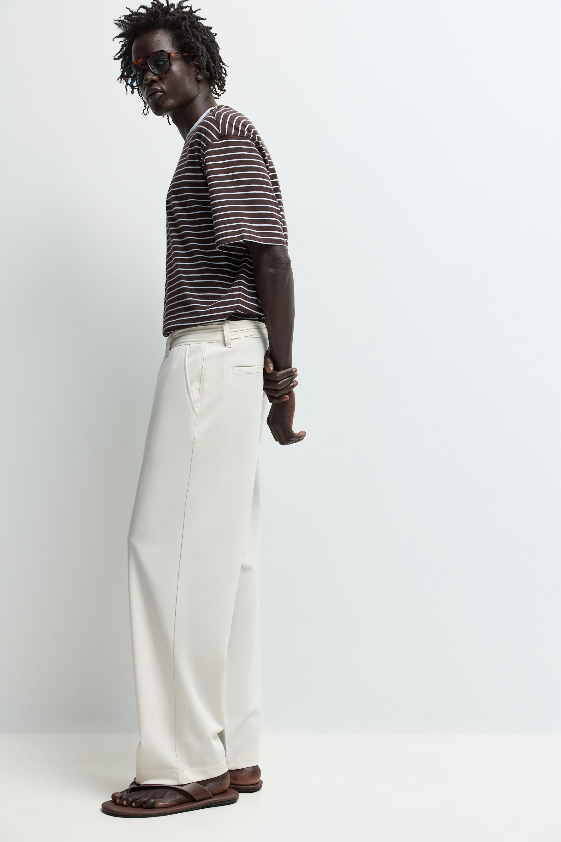 Relaxed fit chino trousers with belt — OFF WHITE