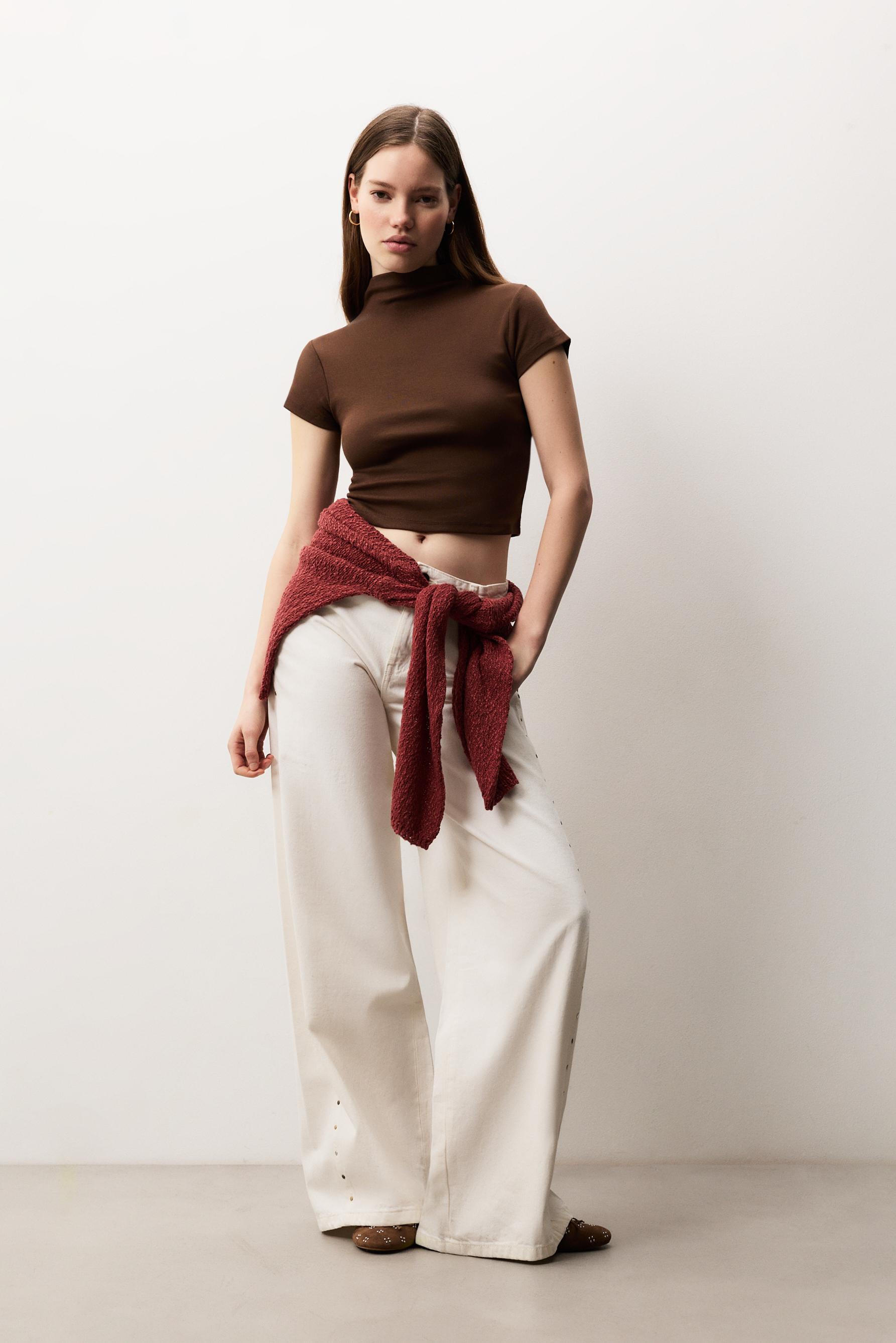 Jeans wide leg tachas