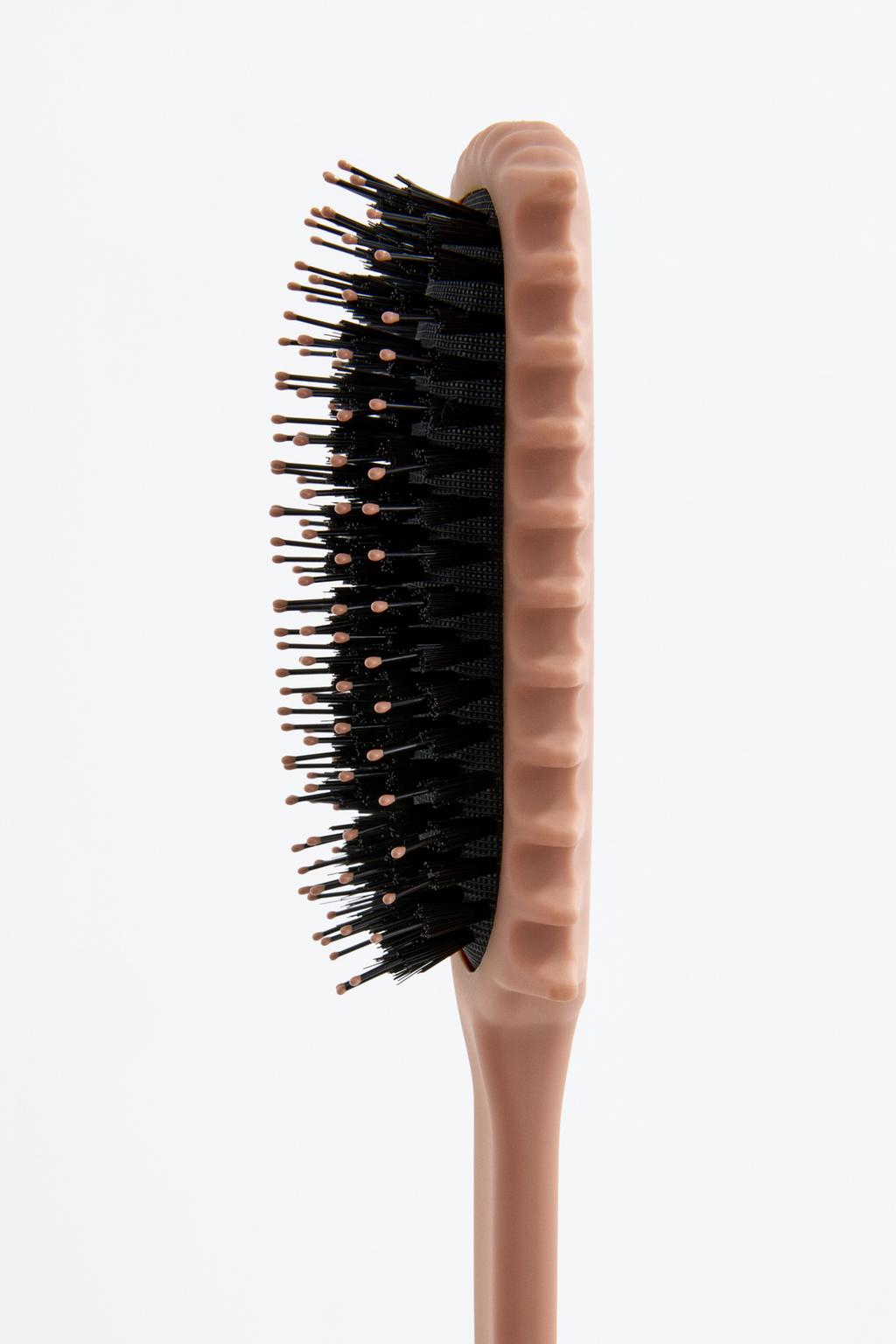 Spazzola per capelli ricci