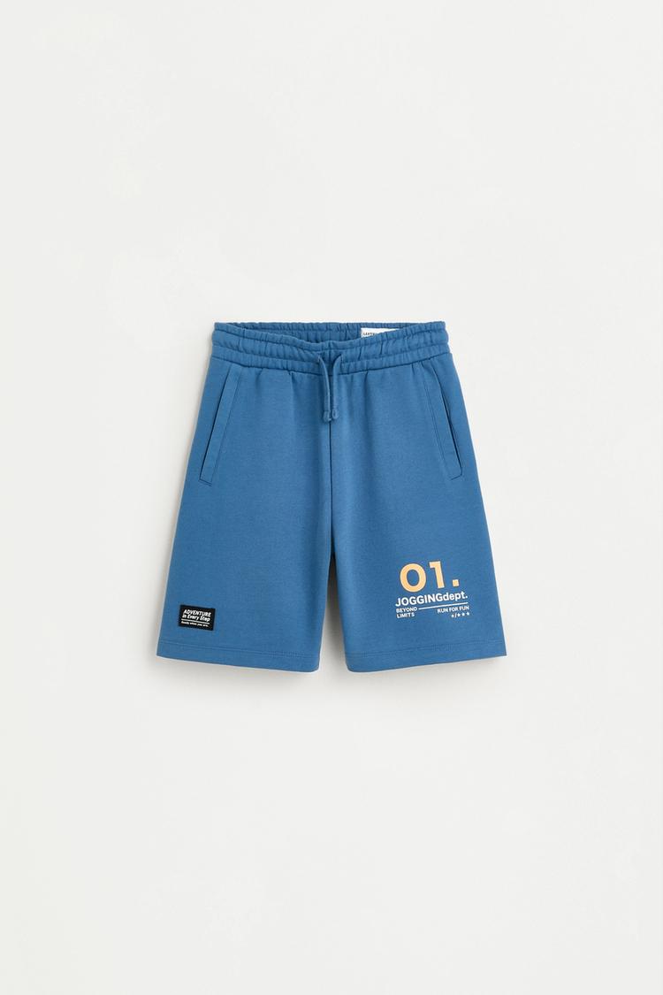 Text print plush Bermuda shorts — FADED BLUE