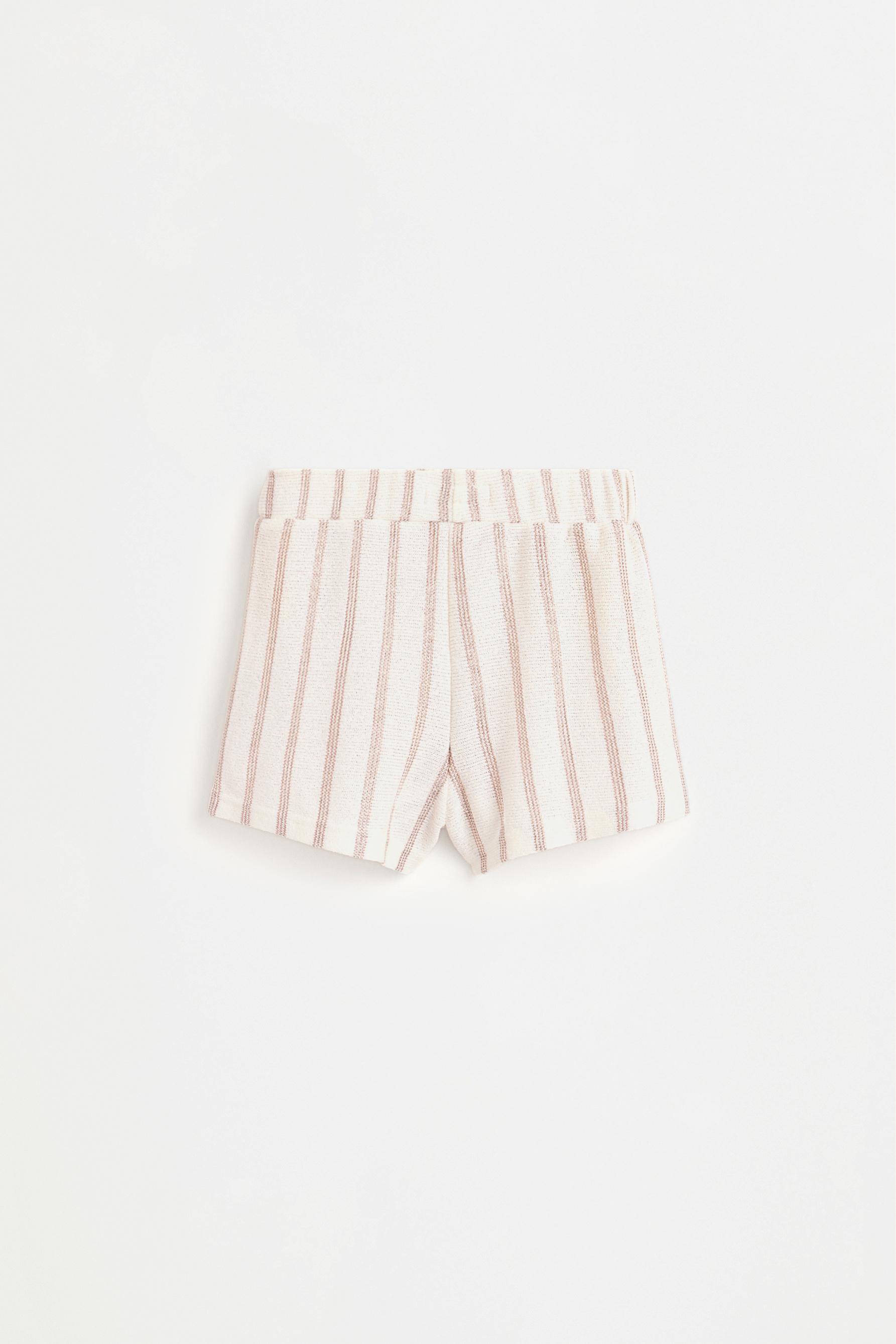 Shimmering bias cut shorts — COPPER
