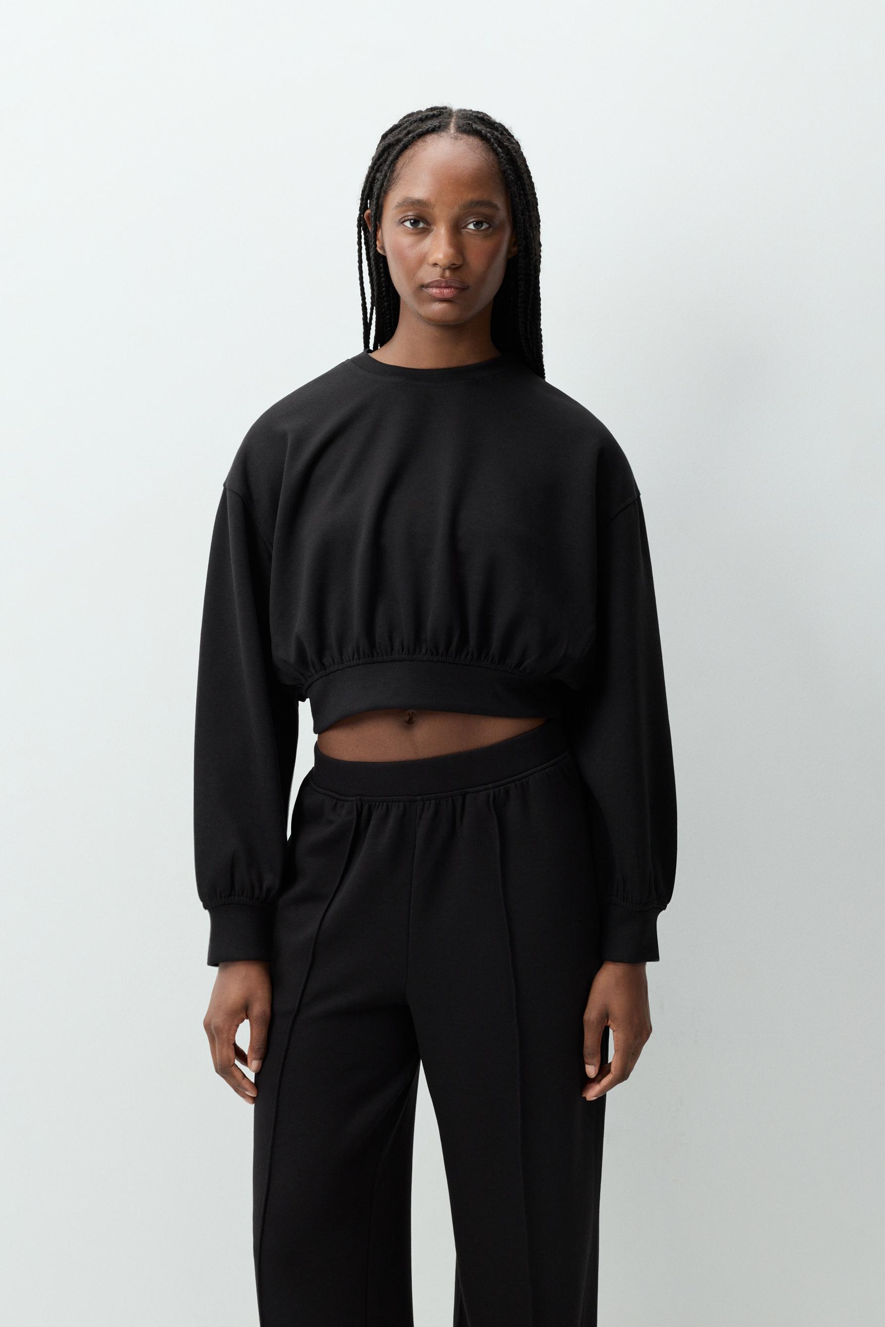 Sudadera deportiva cropped fluida