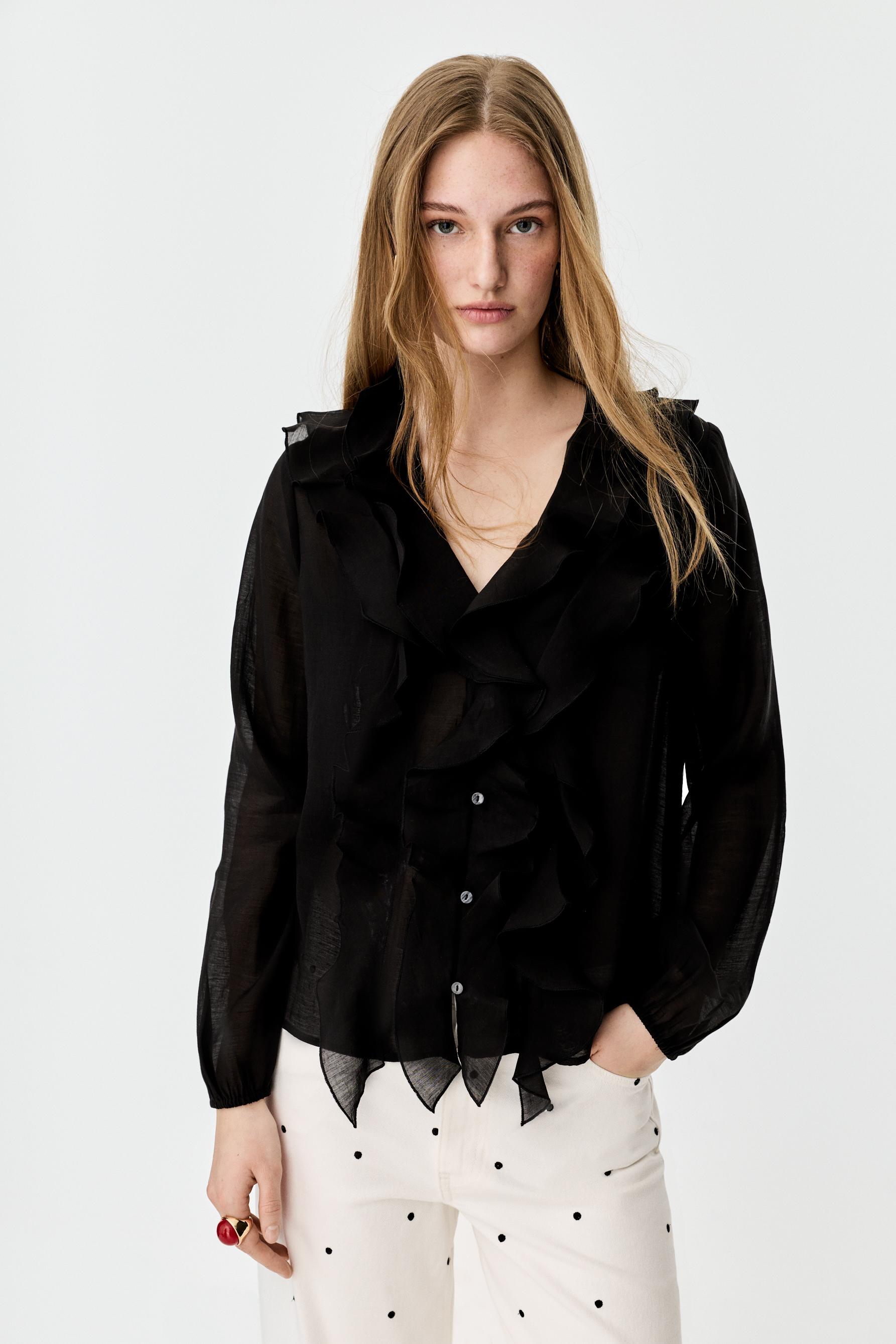 Camisa volantes semitransparente