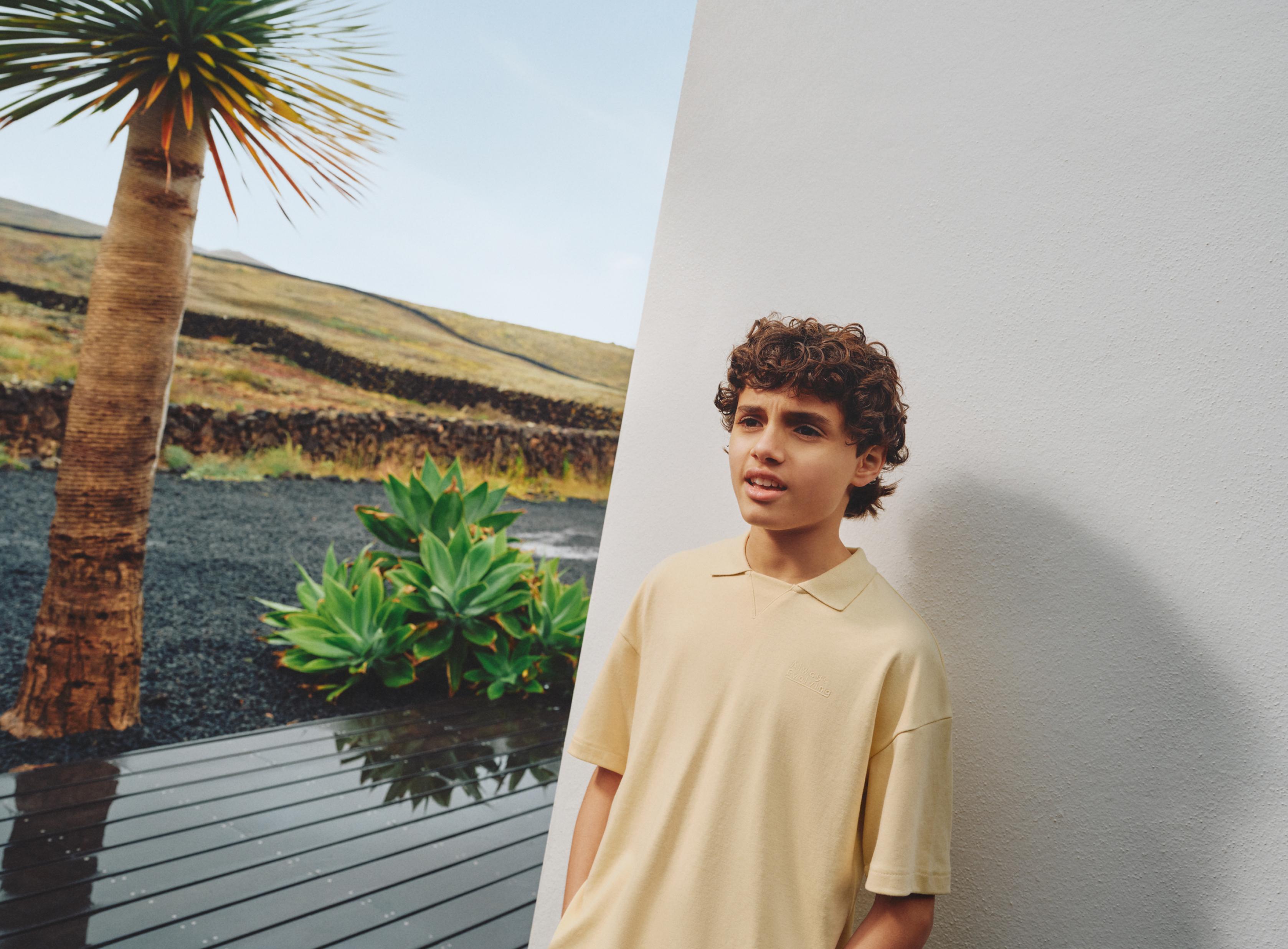 Interlock polo shirt with text — VANILLA