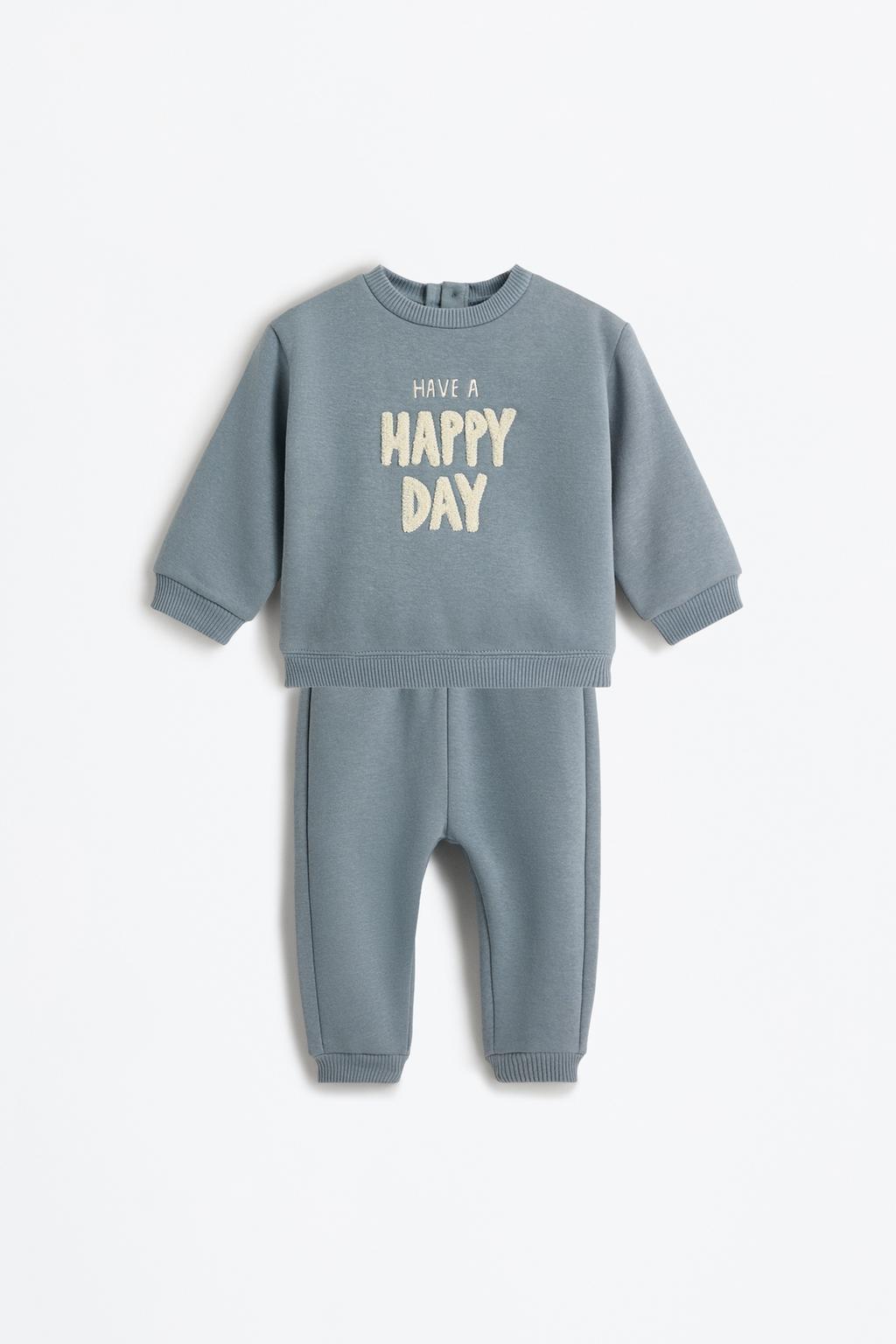 Embroidered scalloped sweatshirt and trousers co-ord