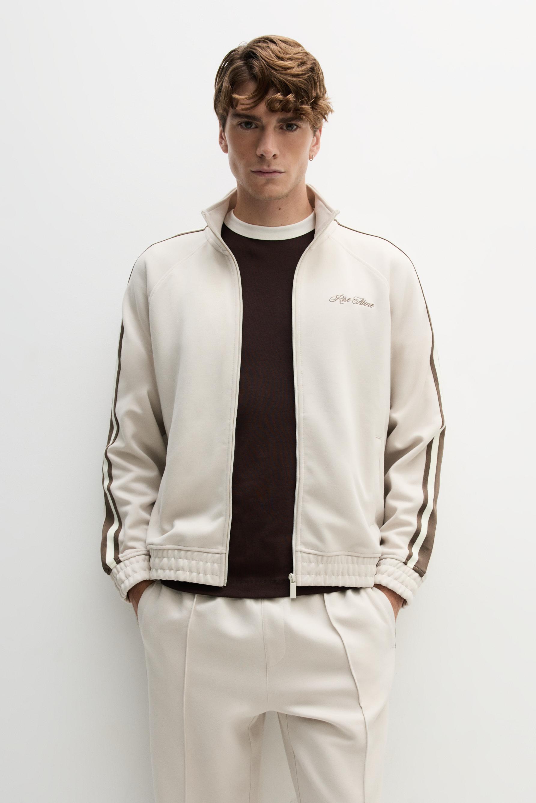 Chaqueta interlock banda