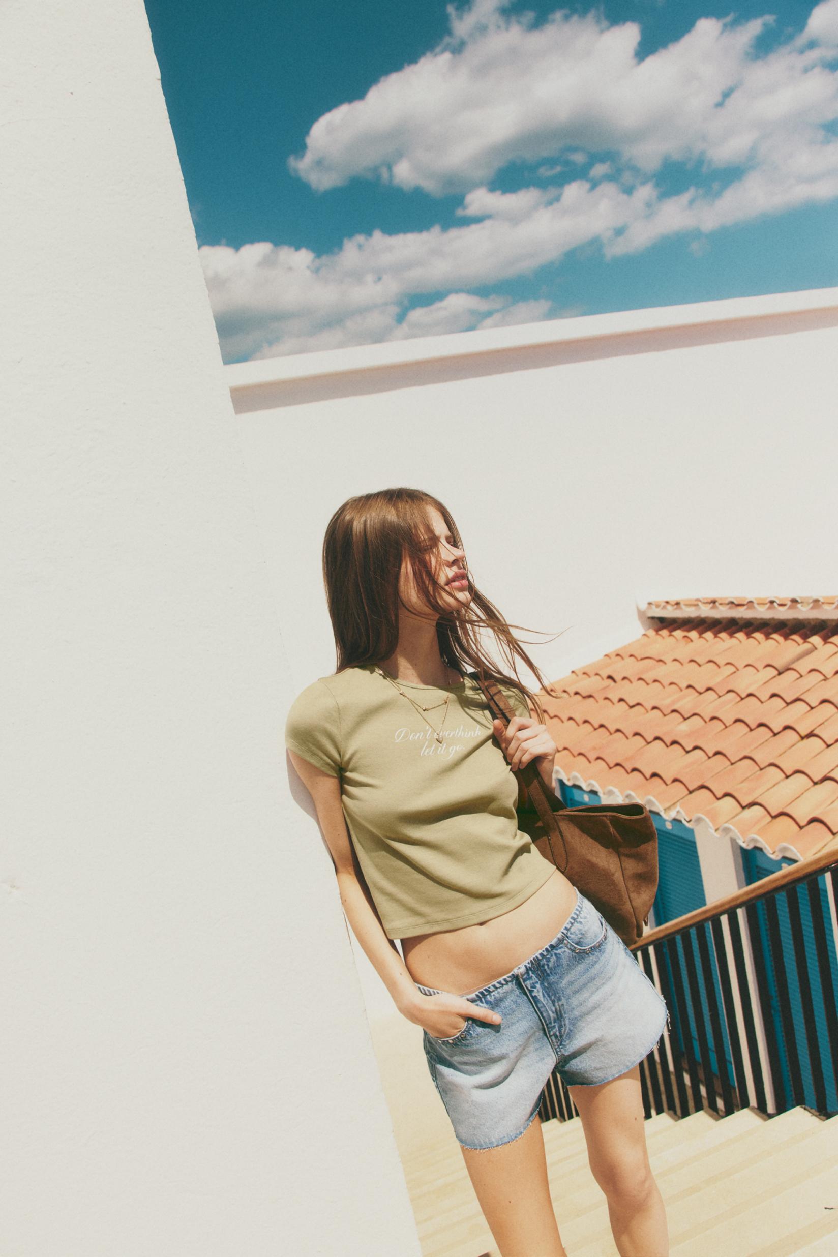 Studded denim shorts — INDIGO
