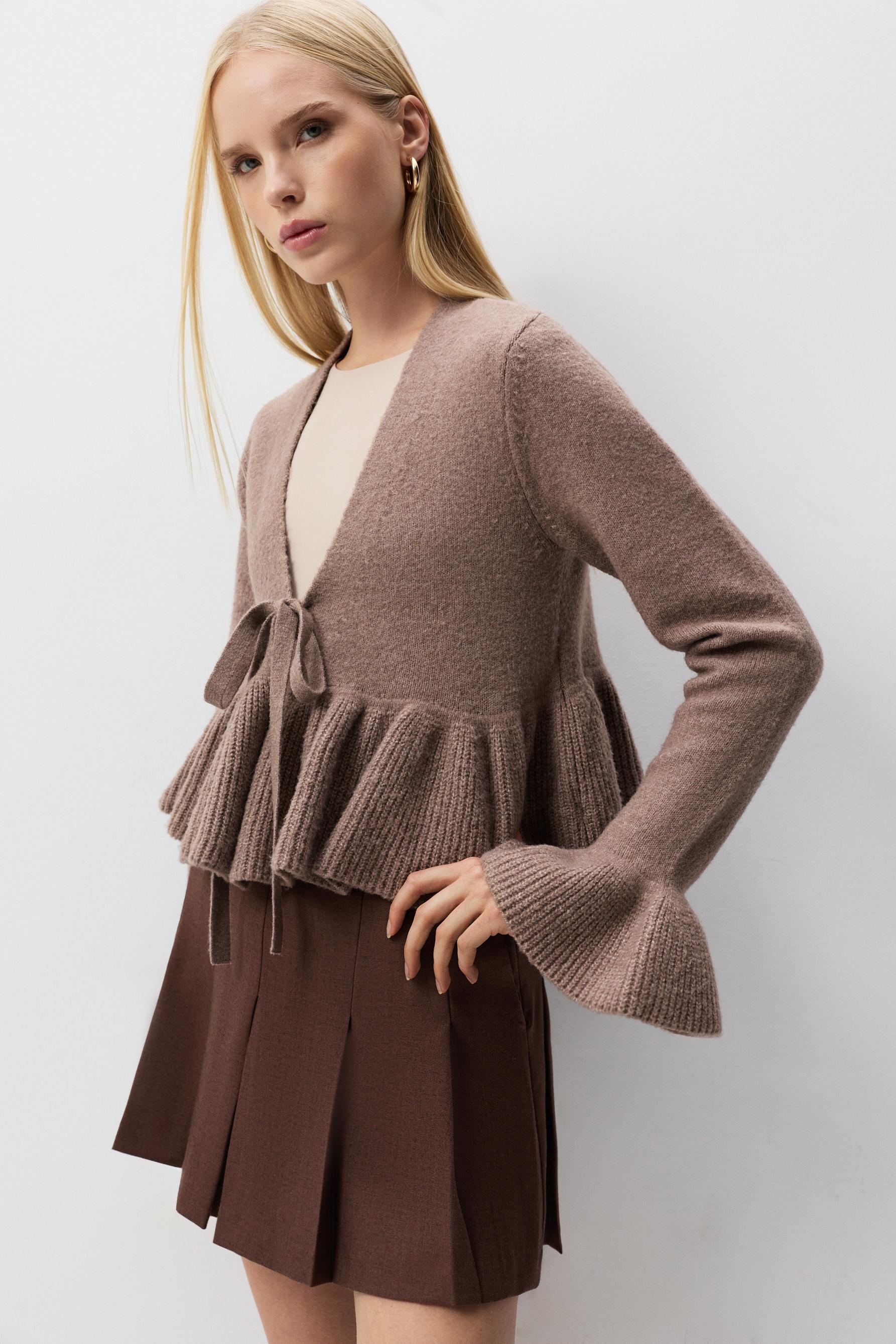 Chaqueta peplum punto