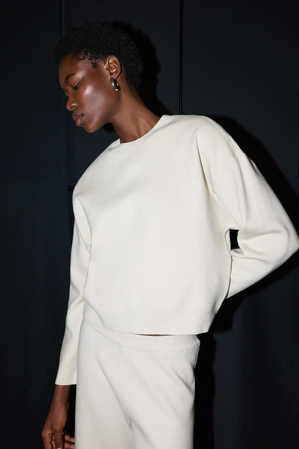 Camisola de malha fluida