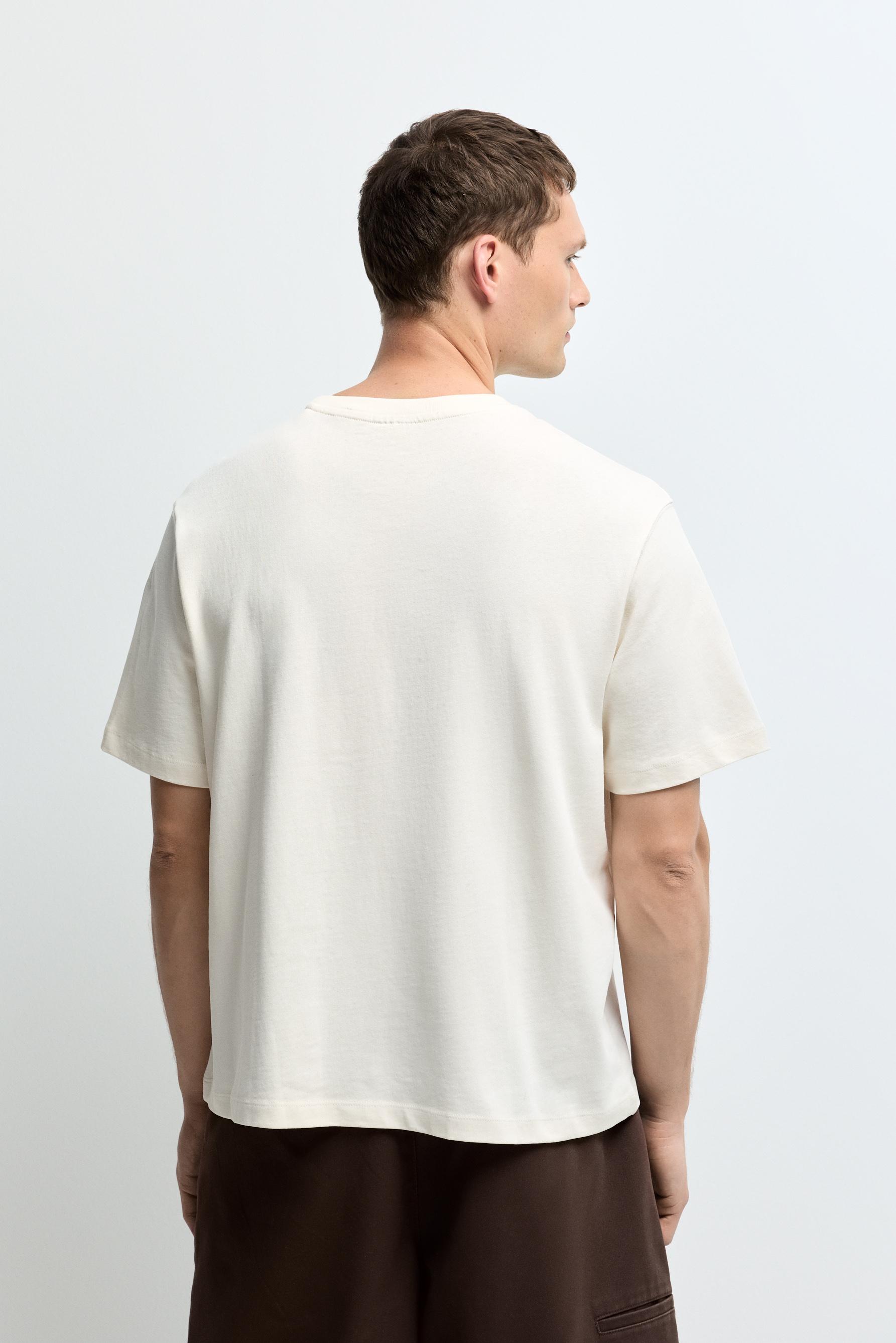 Embroidered text T-shirt — BUTTER