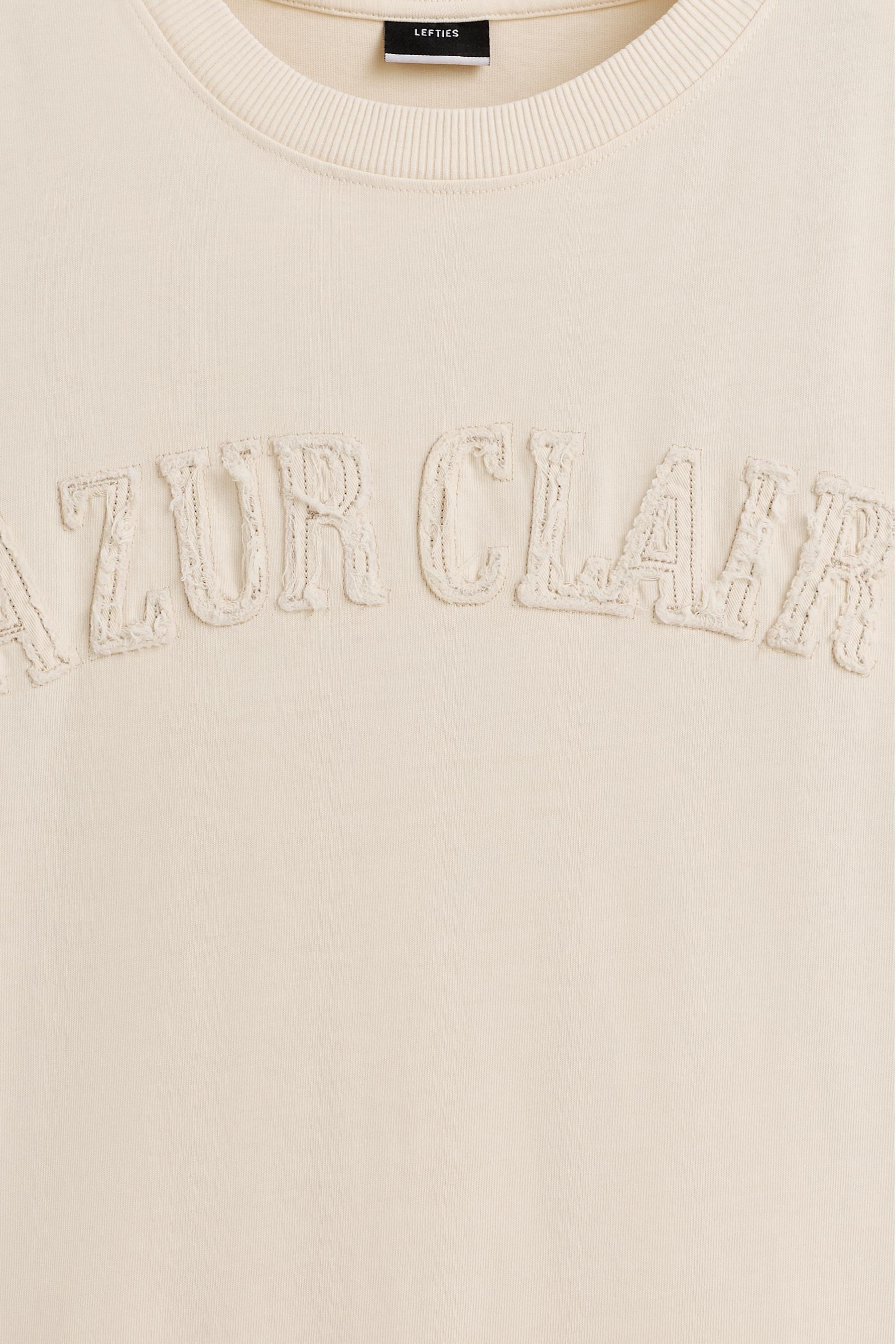 Slogan patch T-shirt — BUTTER
