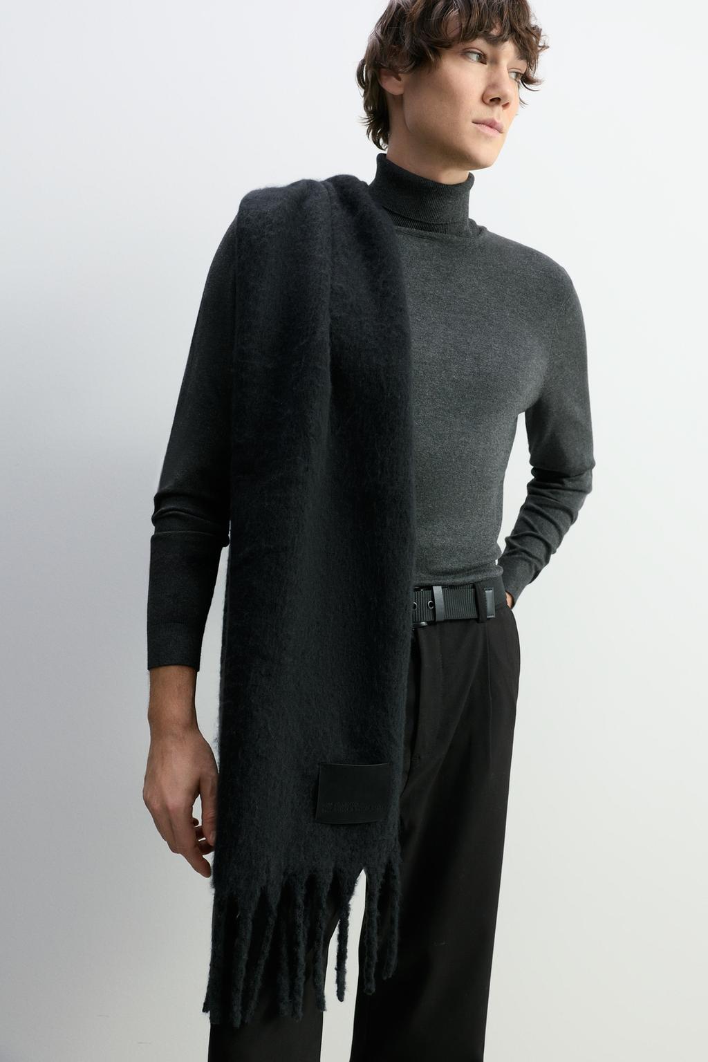 Fringed scarf with patch