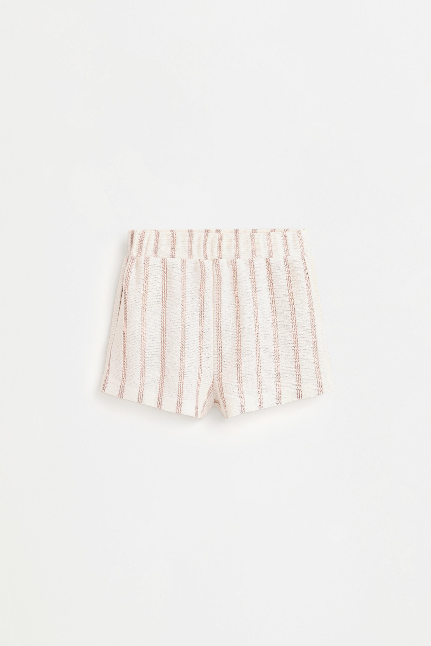 Shimmering bias cut shorts — COPPER