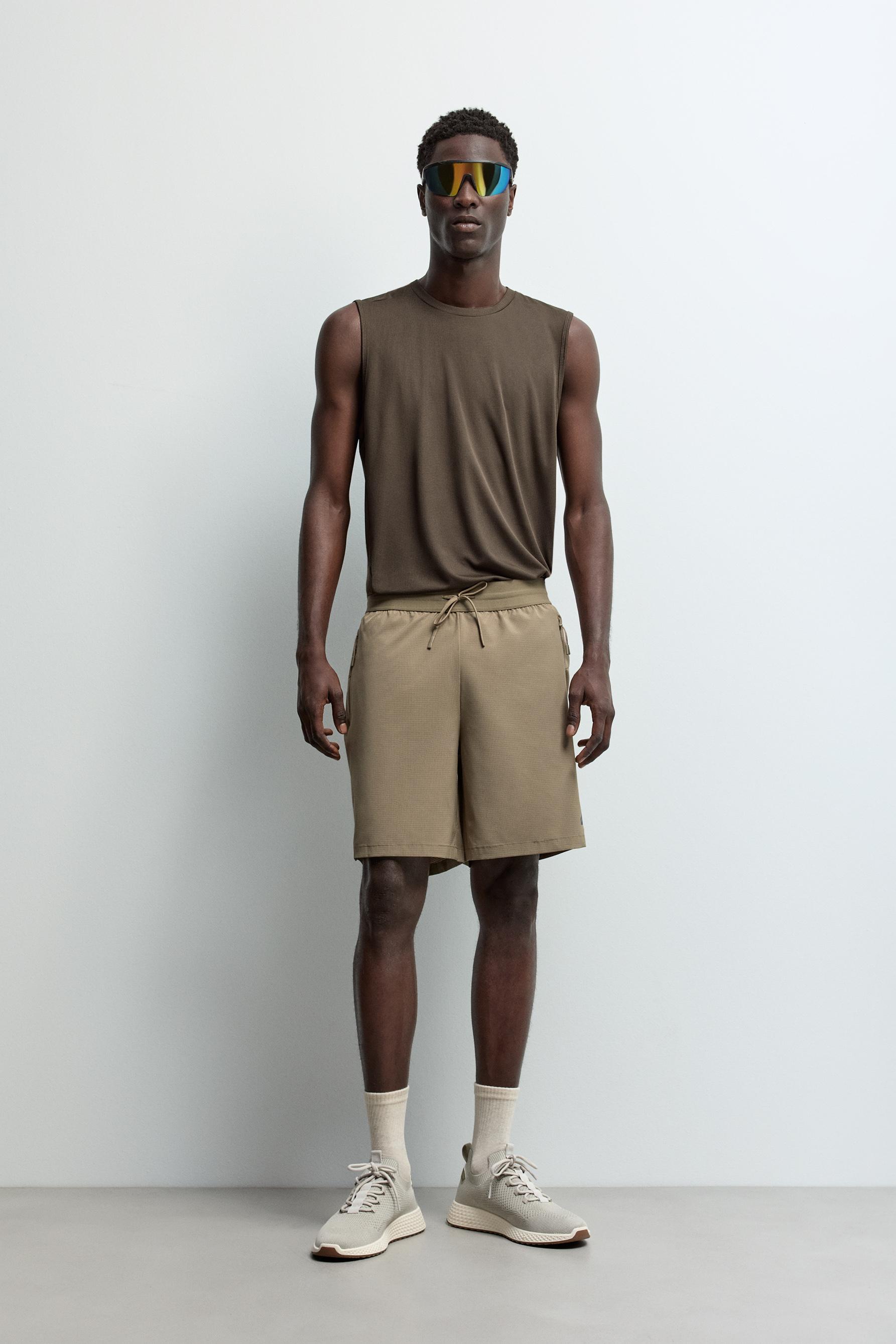 Bermuda sports shorts — MINK
