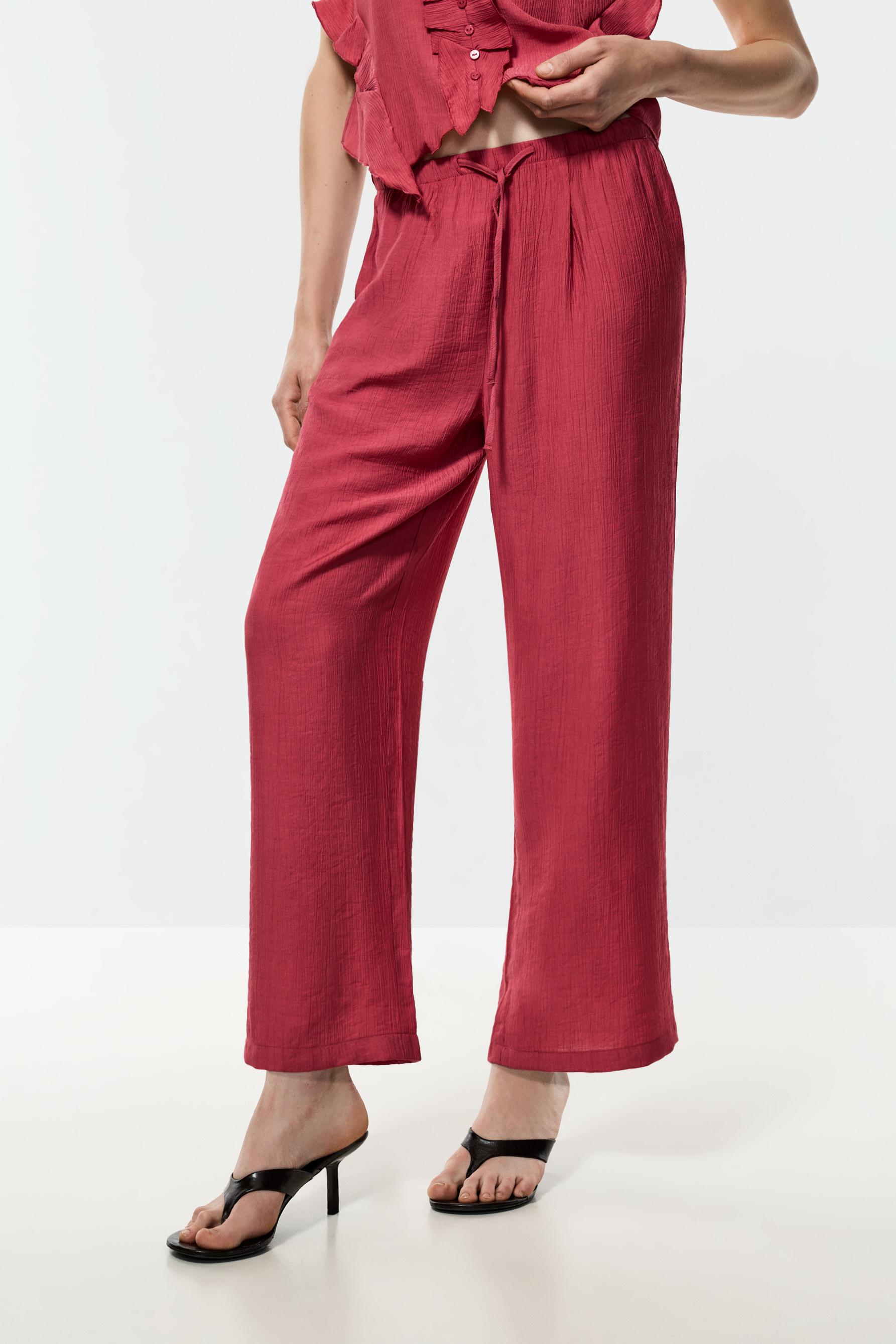 Textured jogging trousers — PALE MAROON