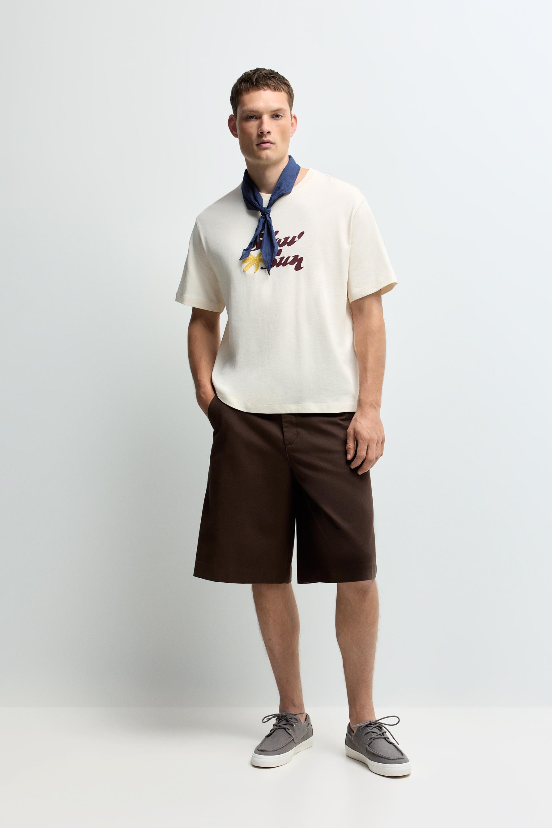 Embroidered text T-shirt — BUTTER