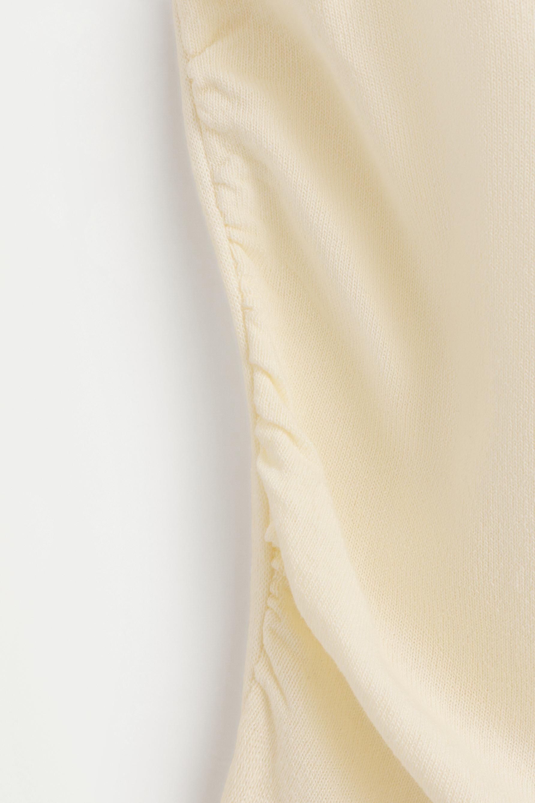 Asymmetric knit top — ECRU