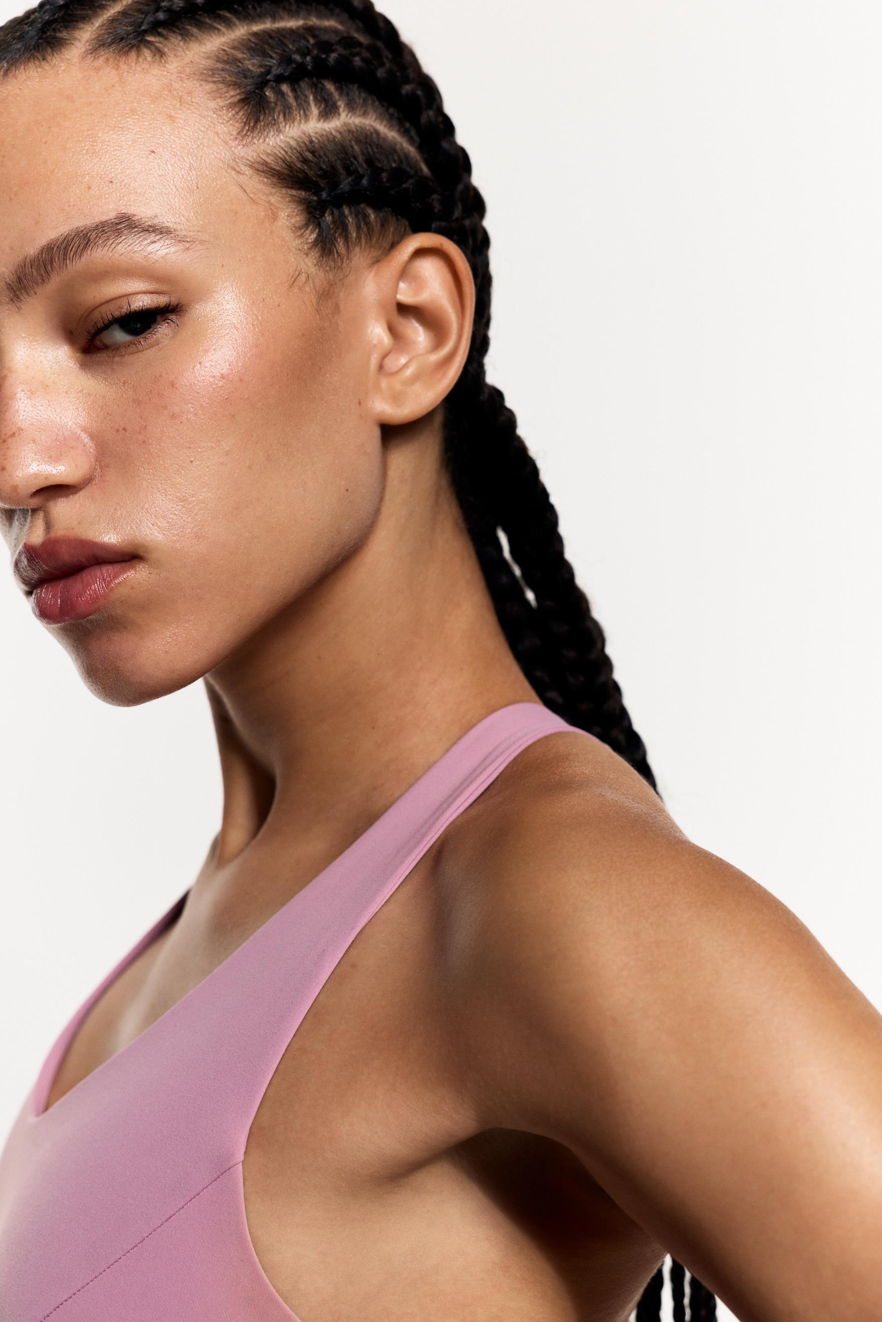 Criss-cross strap sports top — PASTEL PINK