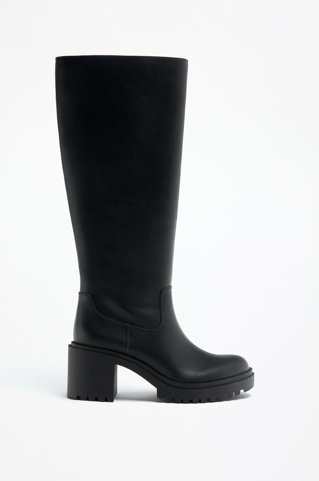 Knee-high boots with track sole