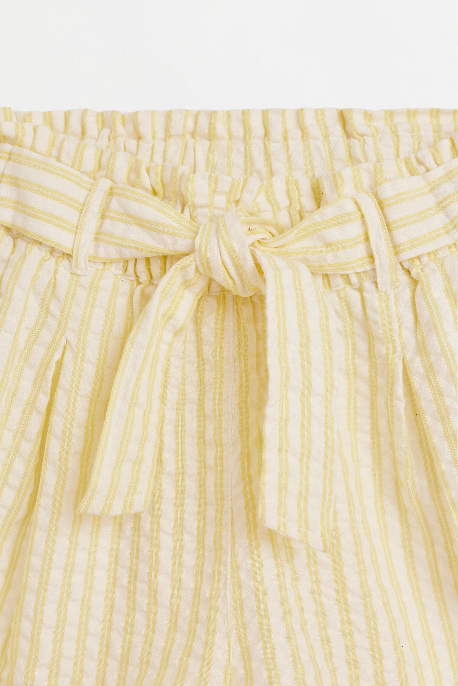 Striped seersucker shorts — YELLOW