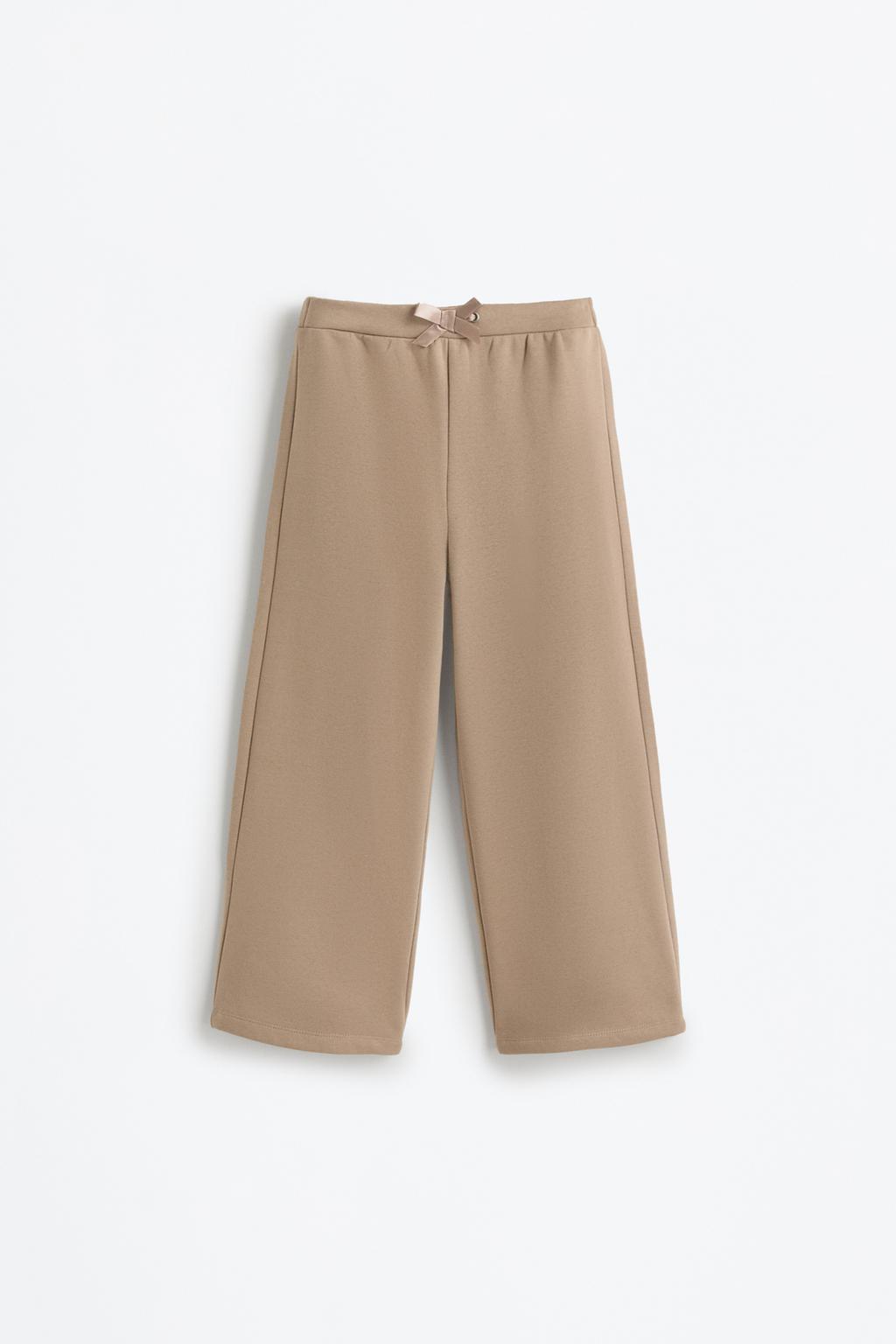 Calças culotte com laço de felpa