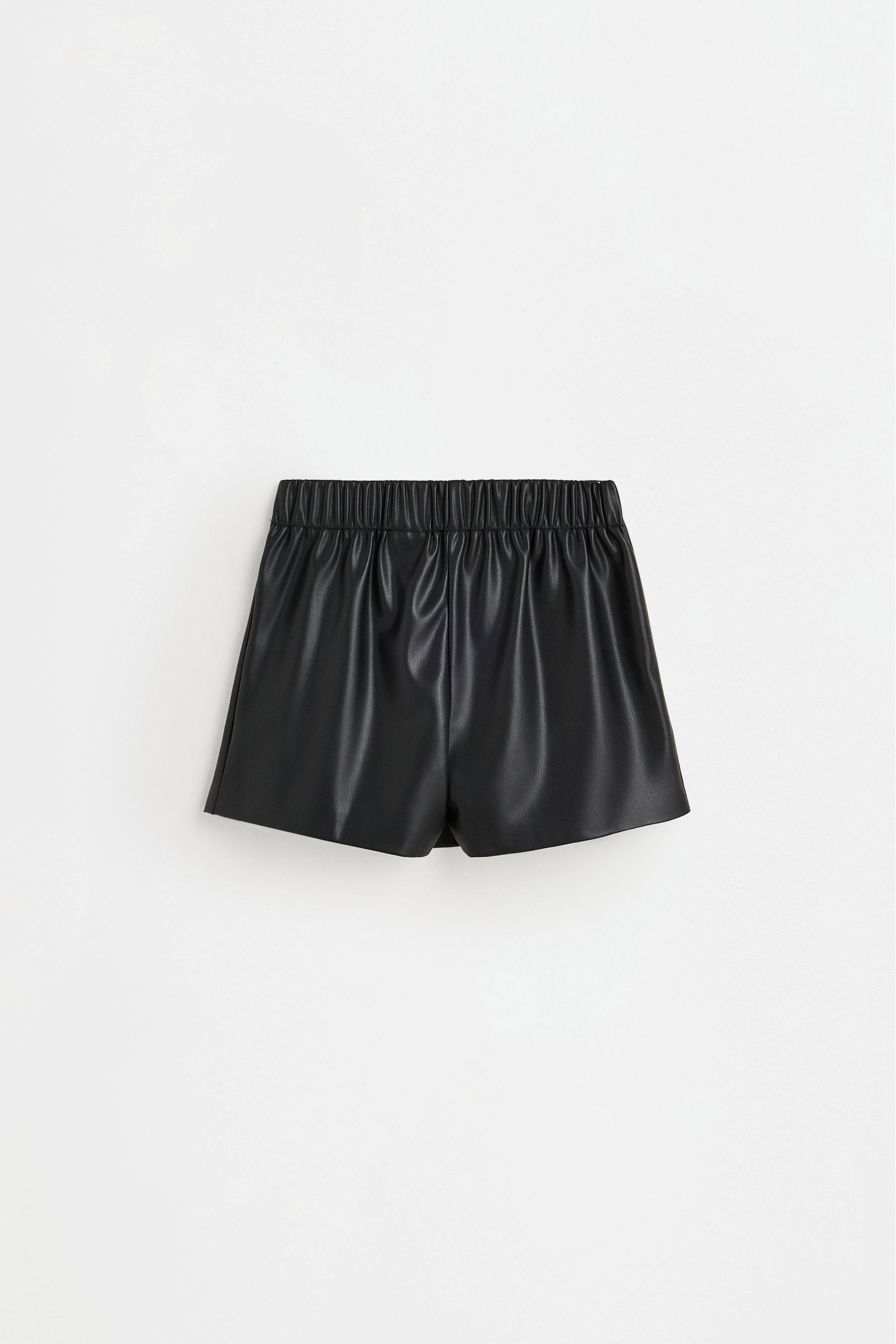 Leather effect skort with hearts — BLACK