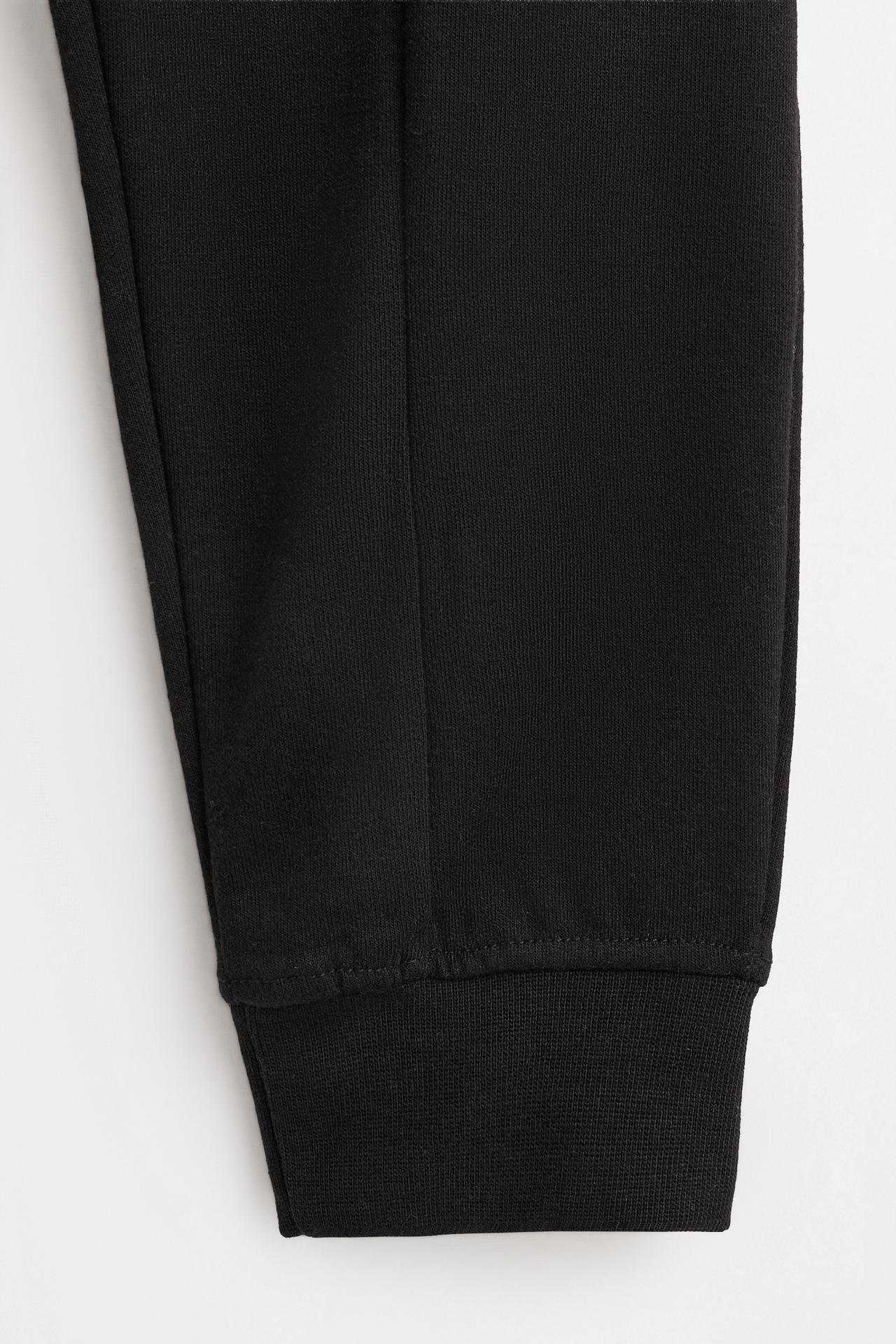Interlock plush joggers — BLACK