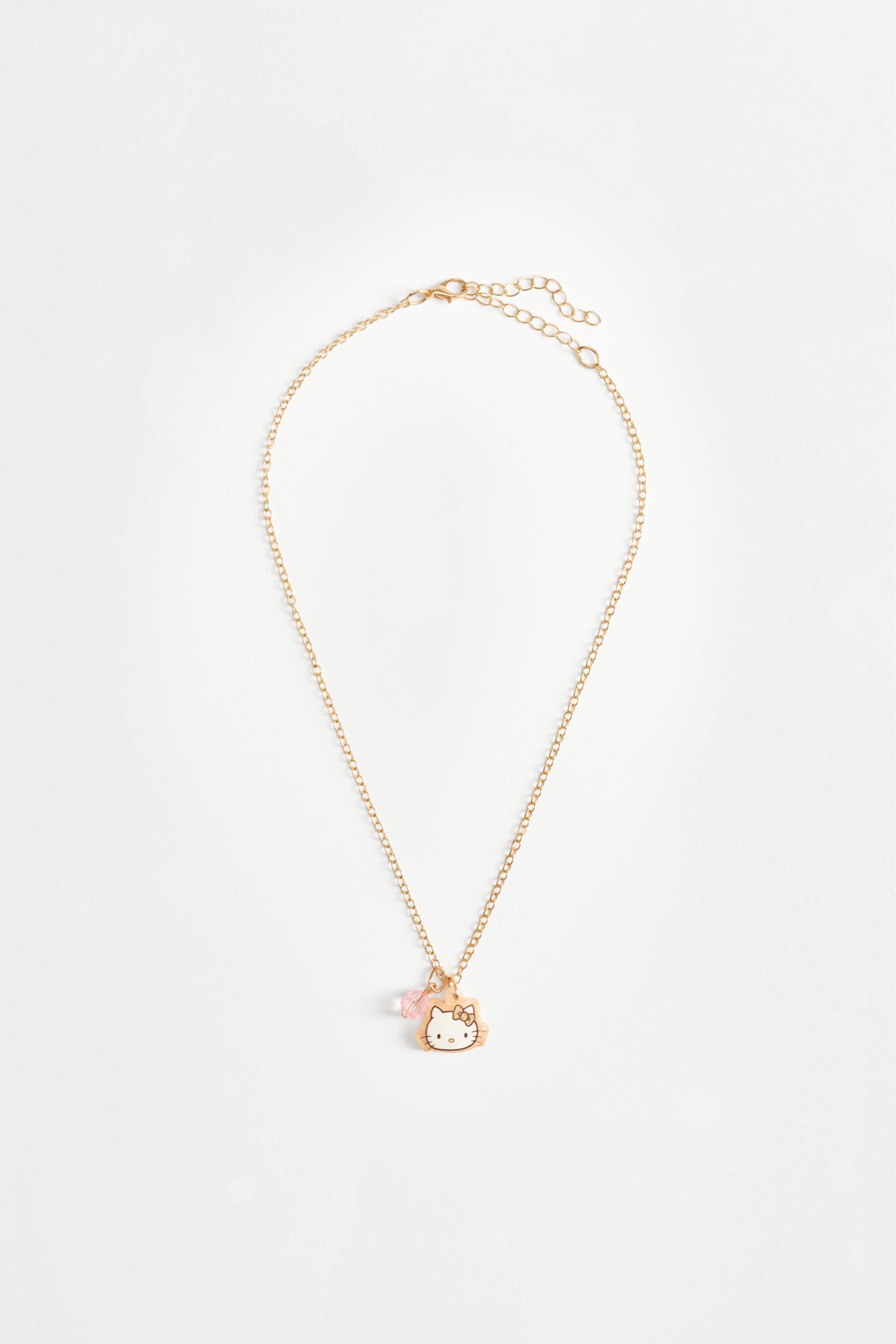 Hello Kitty ©SANRIO necklace and earrings set — BEIGE