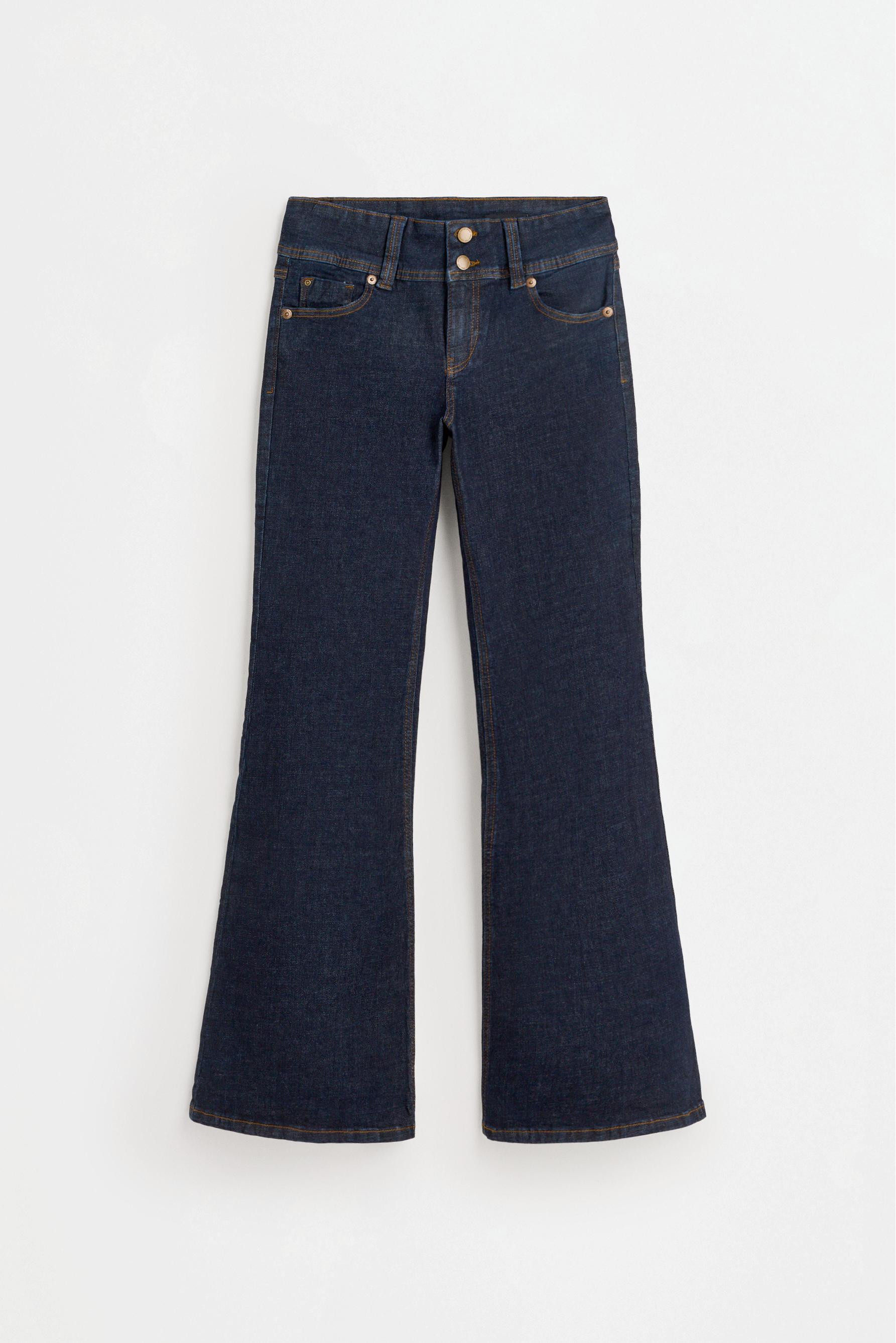 Jeans boot cut bolsillos solapa