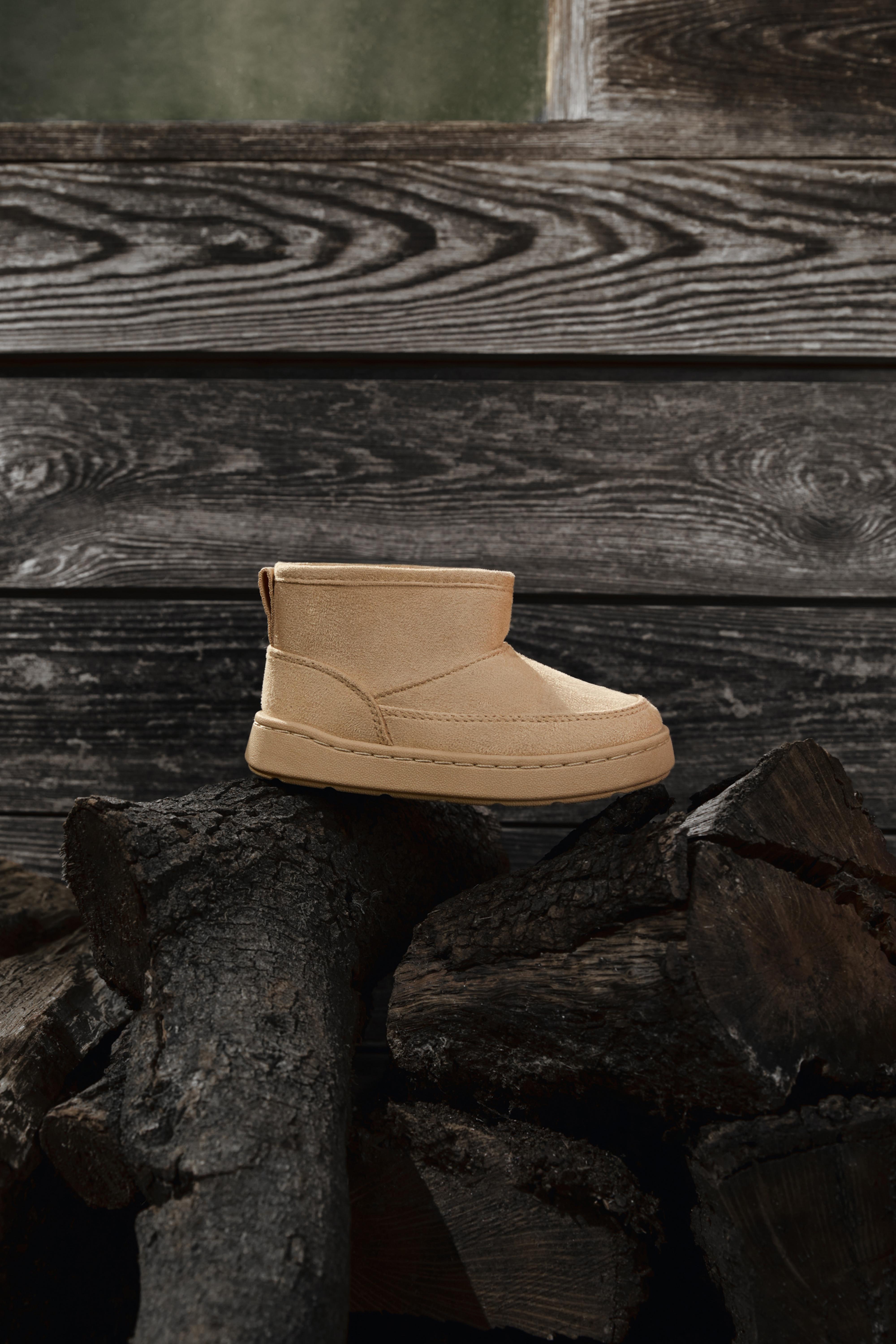 Lined faux fur boot — LEATHER