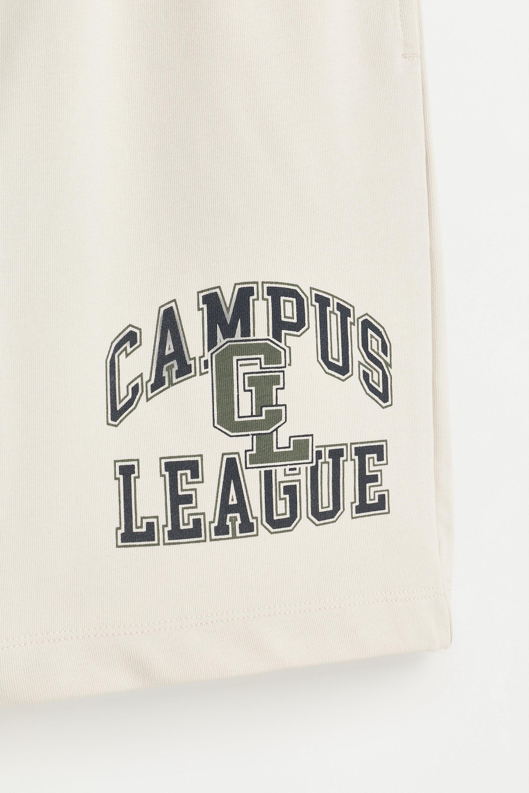 Plush Bermuda shorts with text — PALE MINK