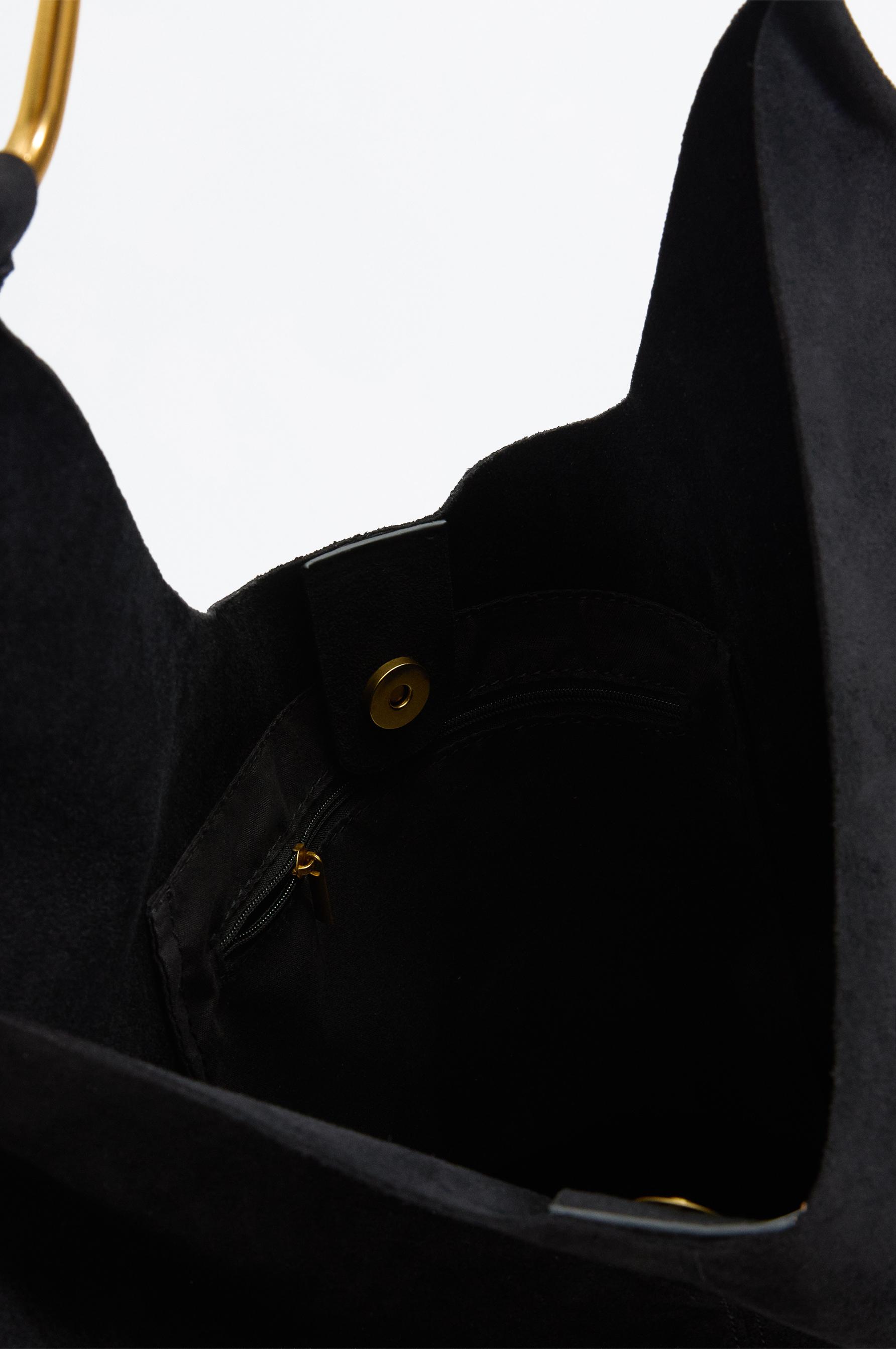 Faux suede bucket bag with ring detail — BLACK