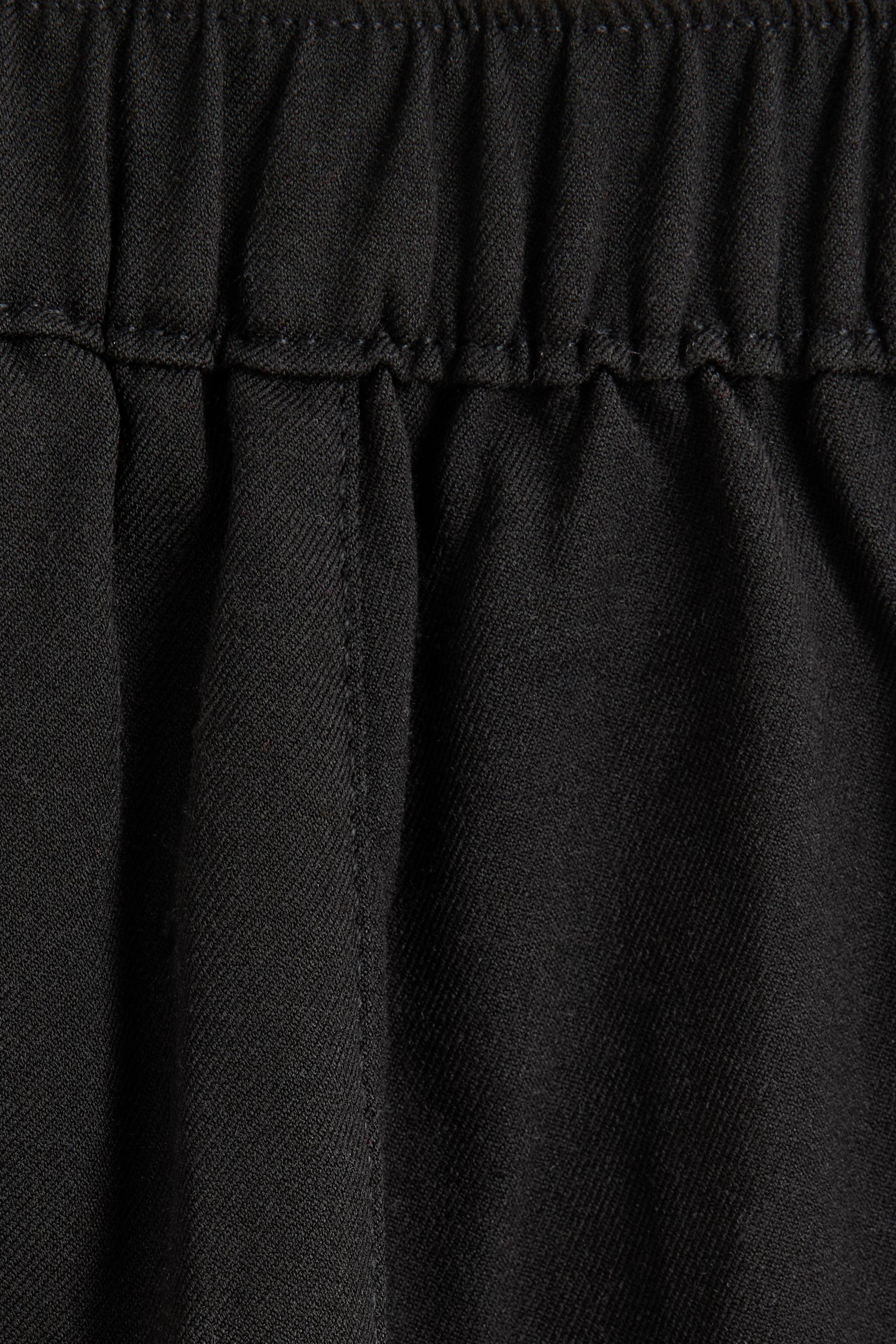 Pleated trousers — BLACK