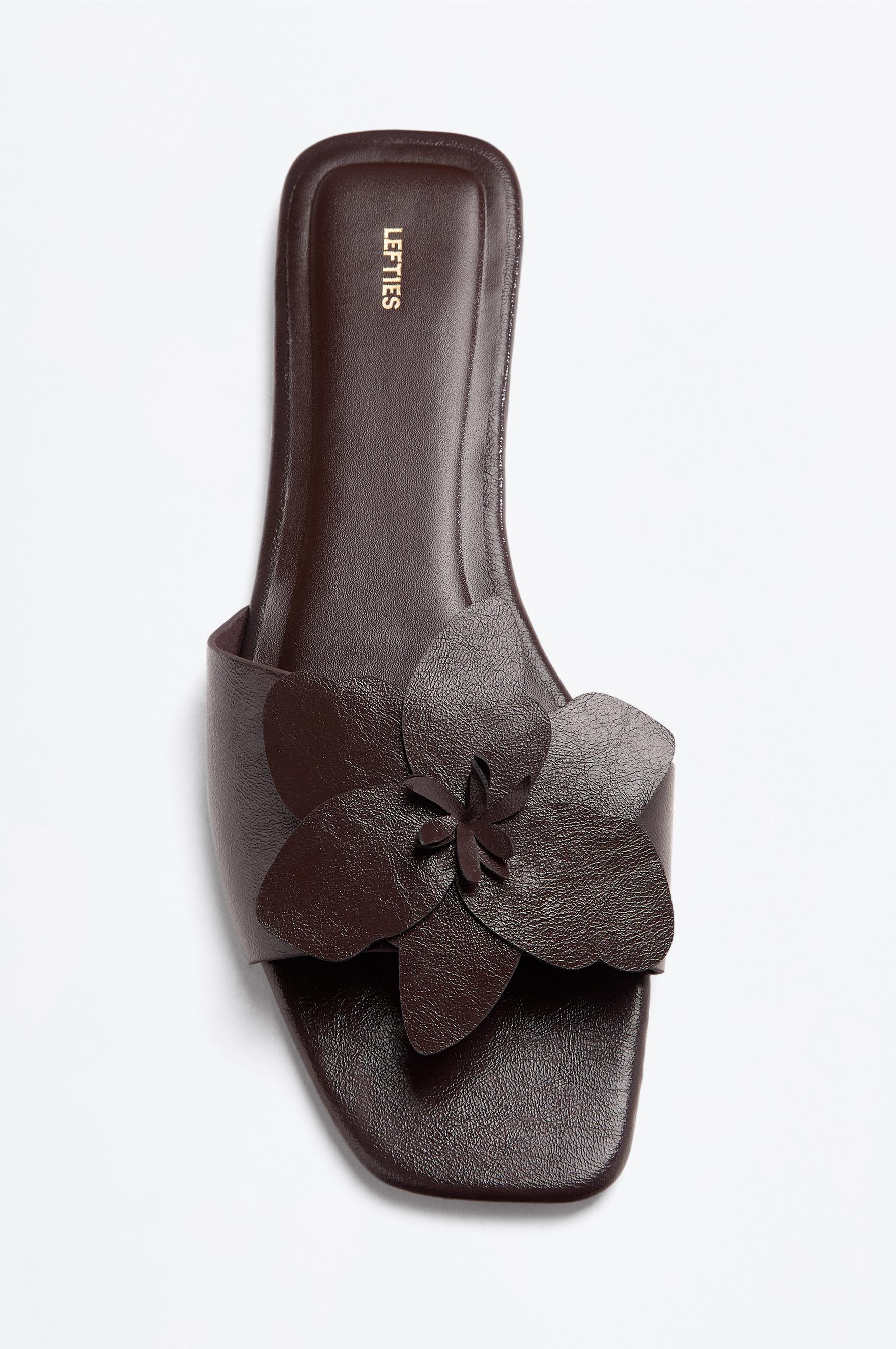 Flat slider sandals with flower detail — BROWN