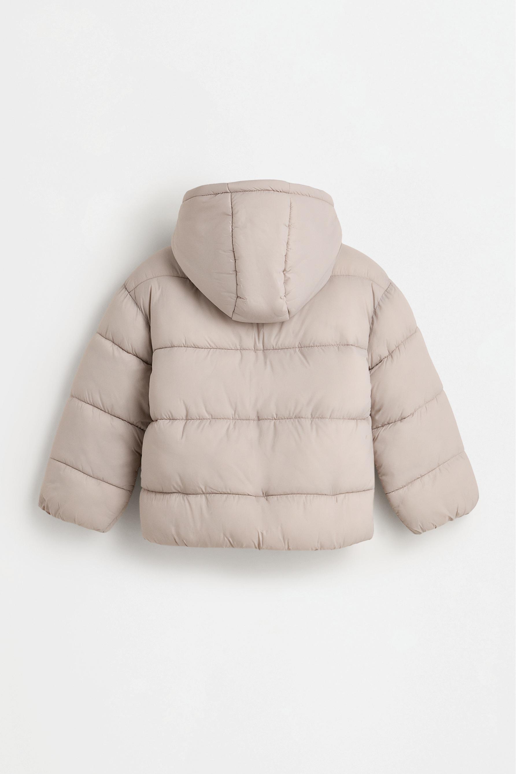 Hooded quilted jacket — HIELO
