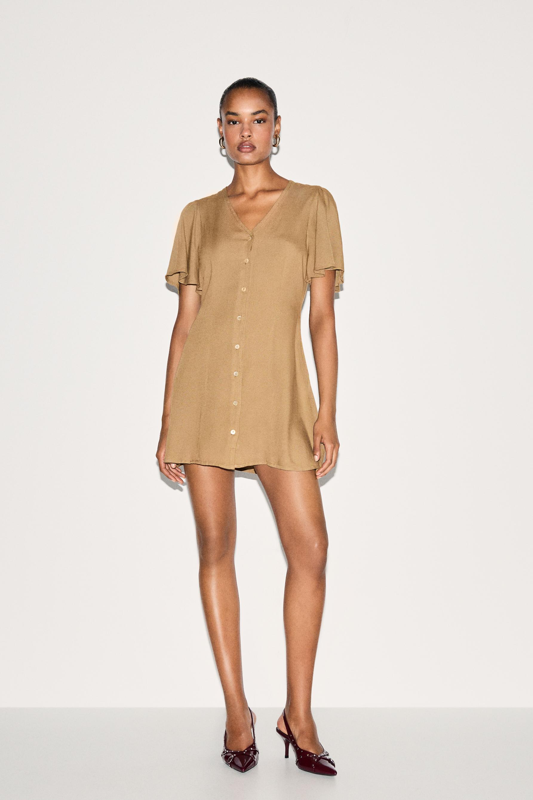 Vestido rústico manga capa