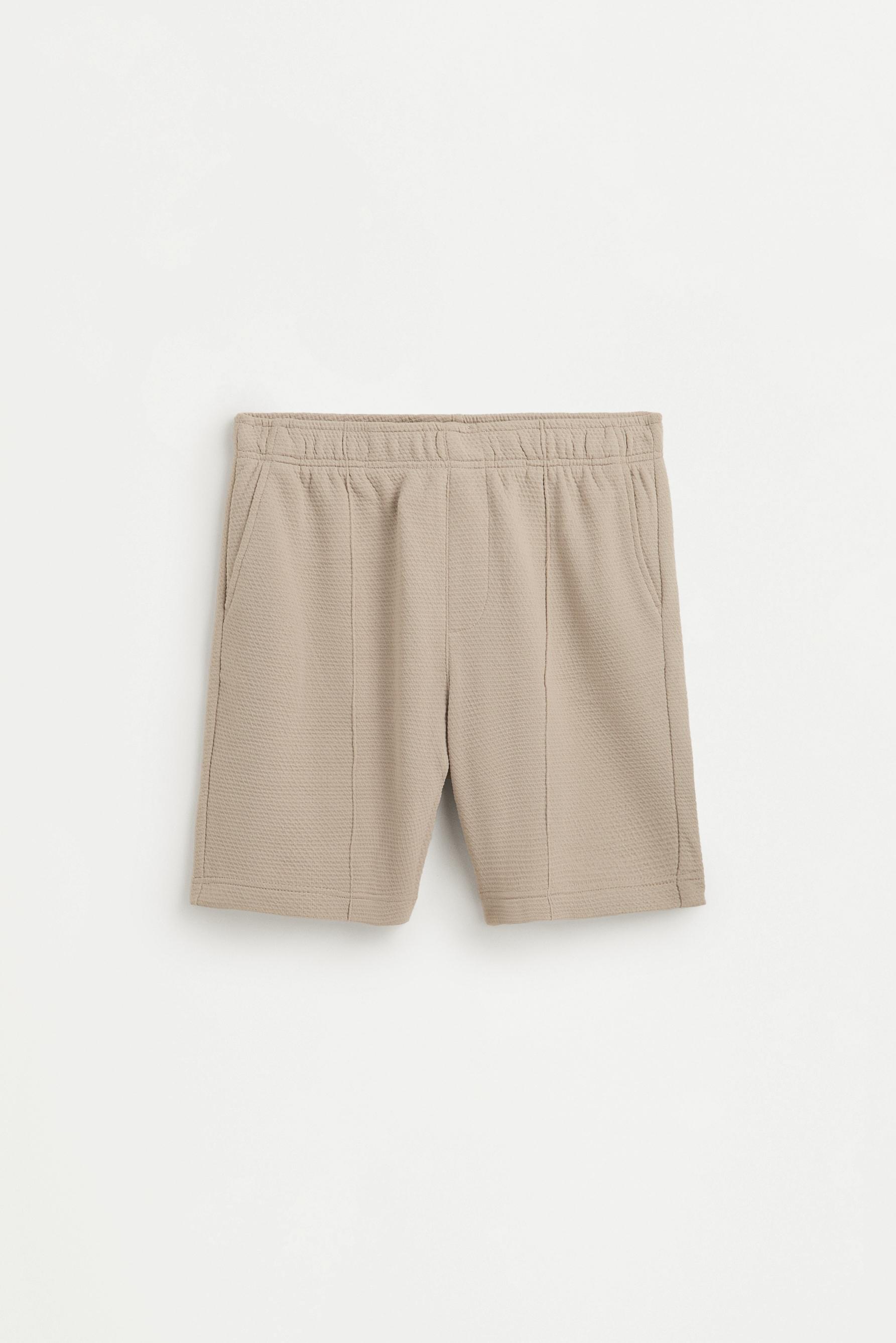 Waffle-textured Bermuda shorts — PALE SAND