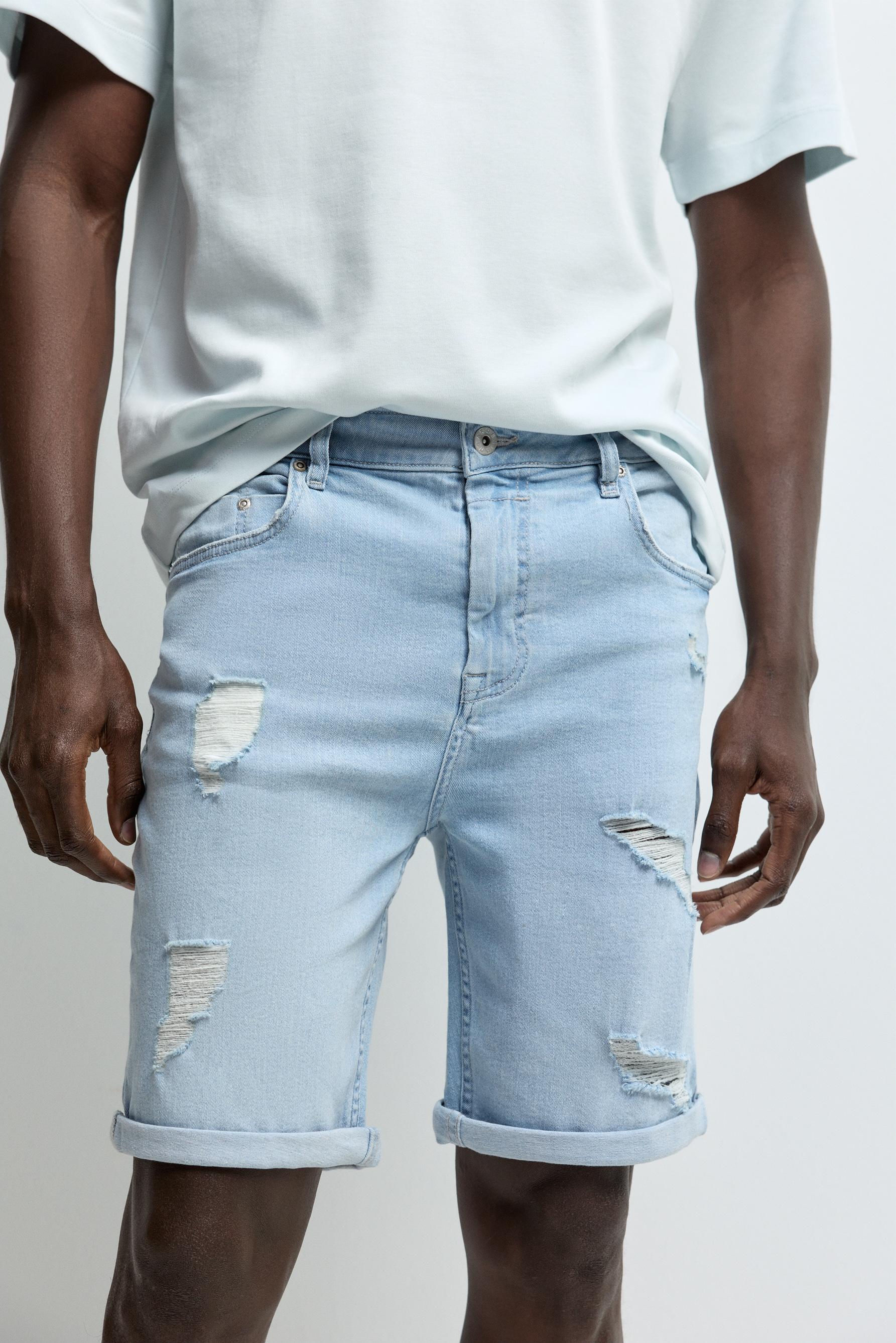 Distressed skinny denim Bermuda shorts — PALE BLUE