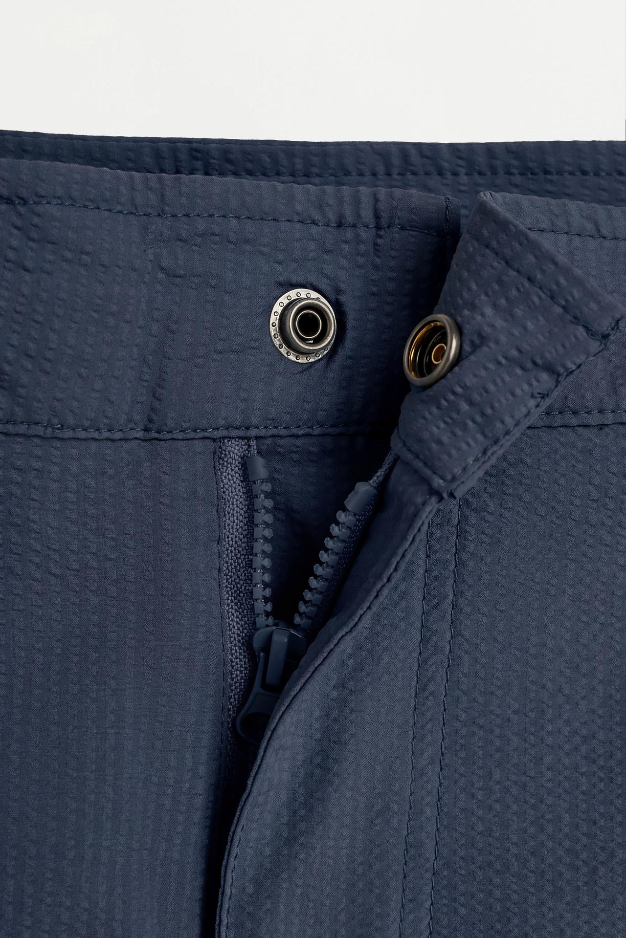 Short swim trunks with buckles — NAVY