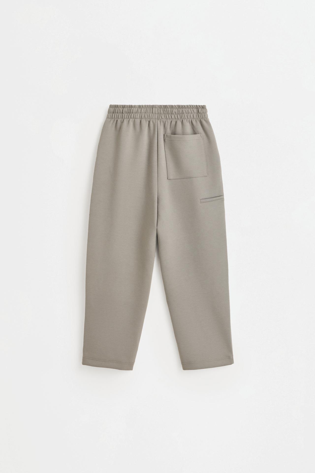 Neoprene-effect trousers — PALE KHAKI