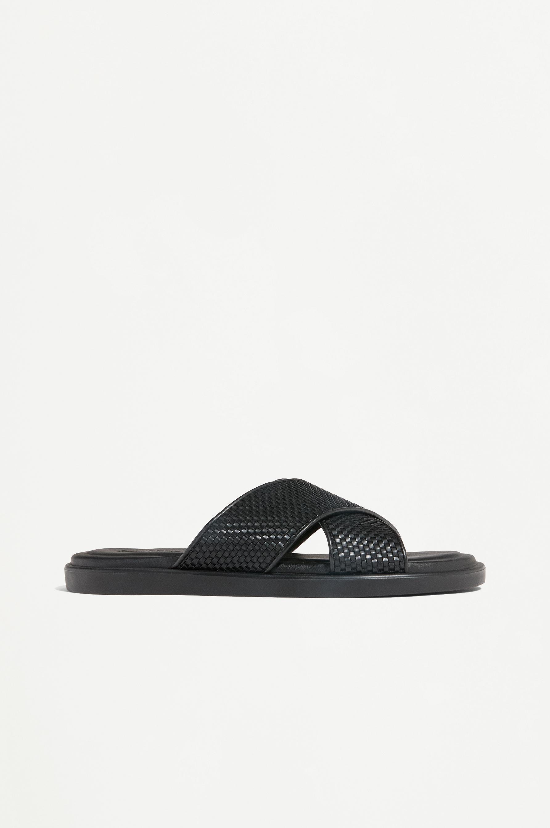 Crossed braided strap sandals — BLACK
