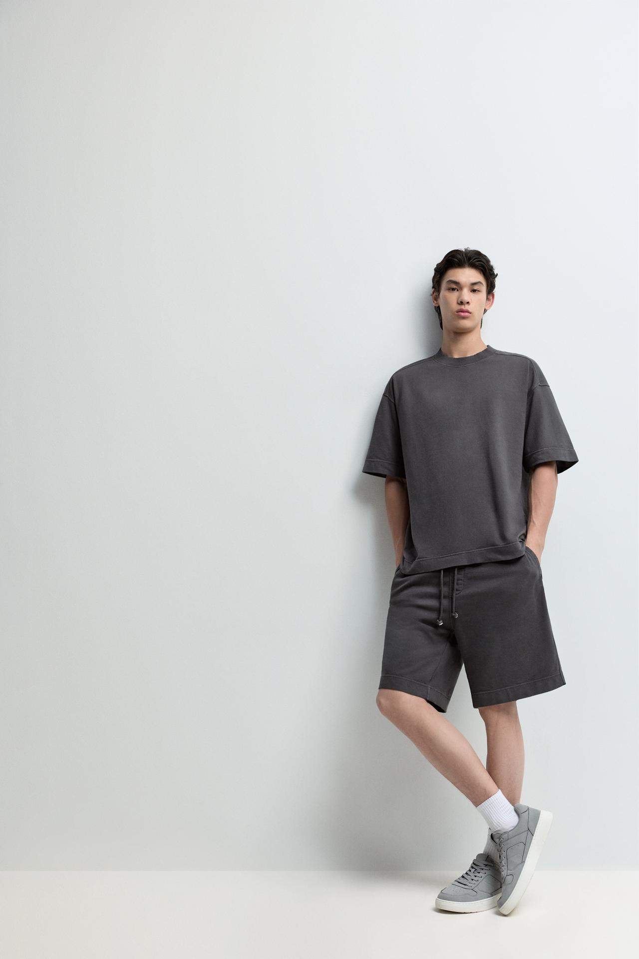 Faded-effect tracksuit Bermuda shorts — BLACK