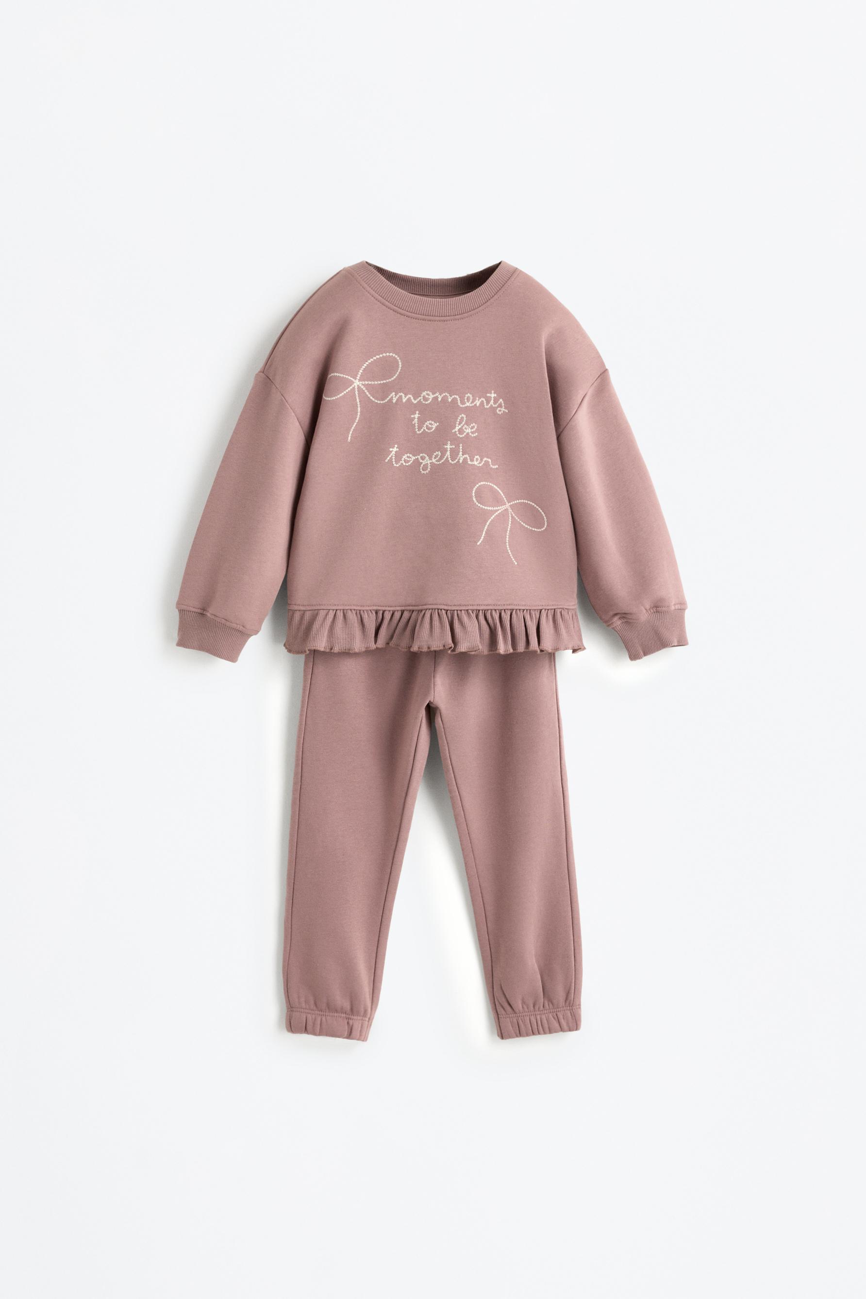 Conjunto sudadera volante y pantalón